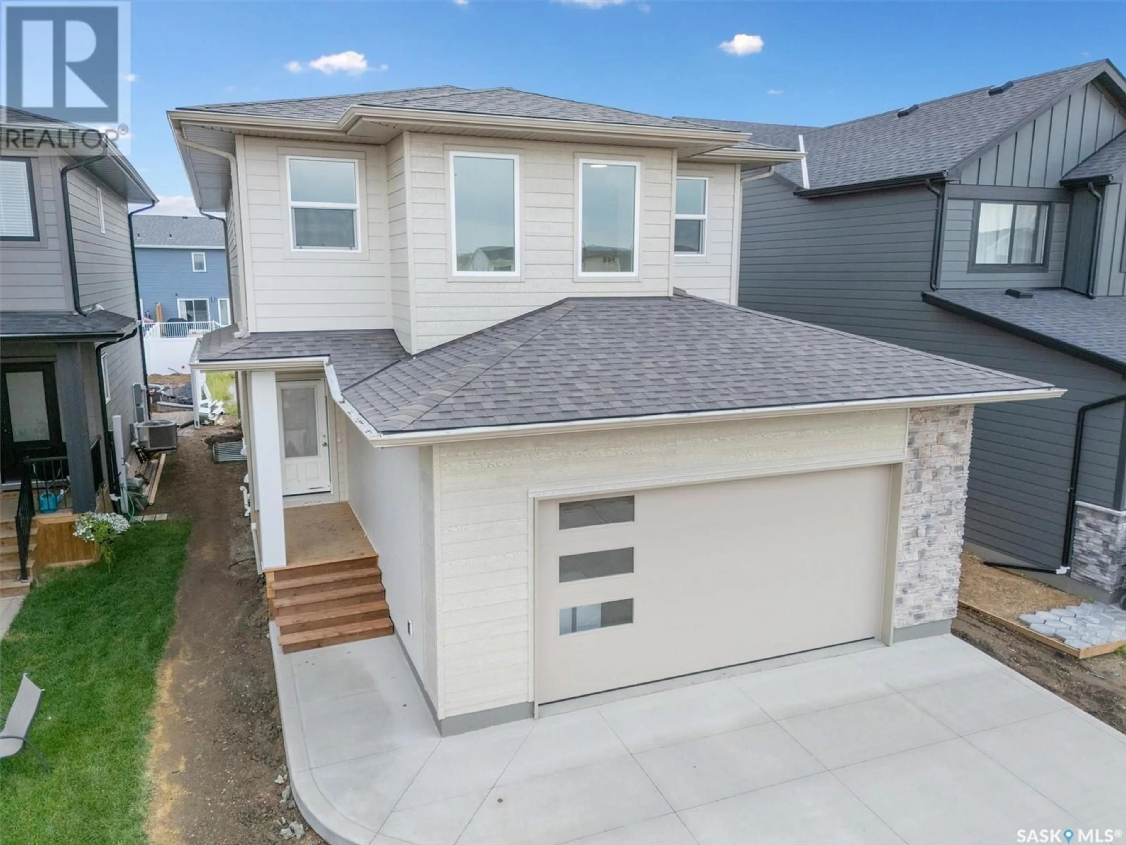 A pic from outside/outdoor area/front of a property/back of a property/a pic from drone, street for 551 PEPPER VIEW, Saskatoon Saskatchewan S7V1T2