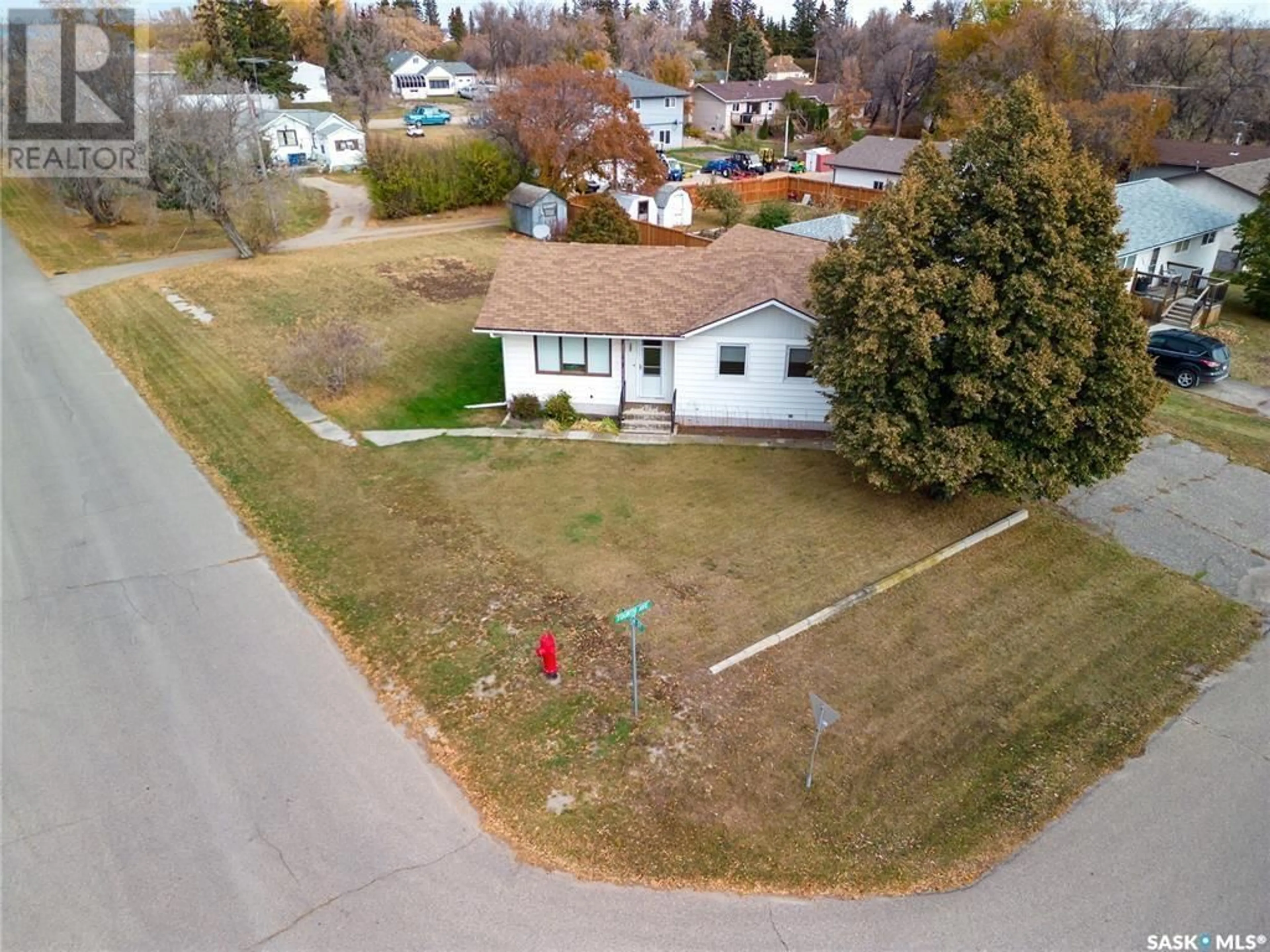 A pic from outside/outdoor area/front of a property/back of a property/a pic from drone, street for 701 4TH AVENUE, Raymore Saskatchewan S0A3J0