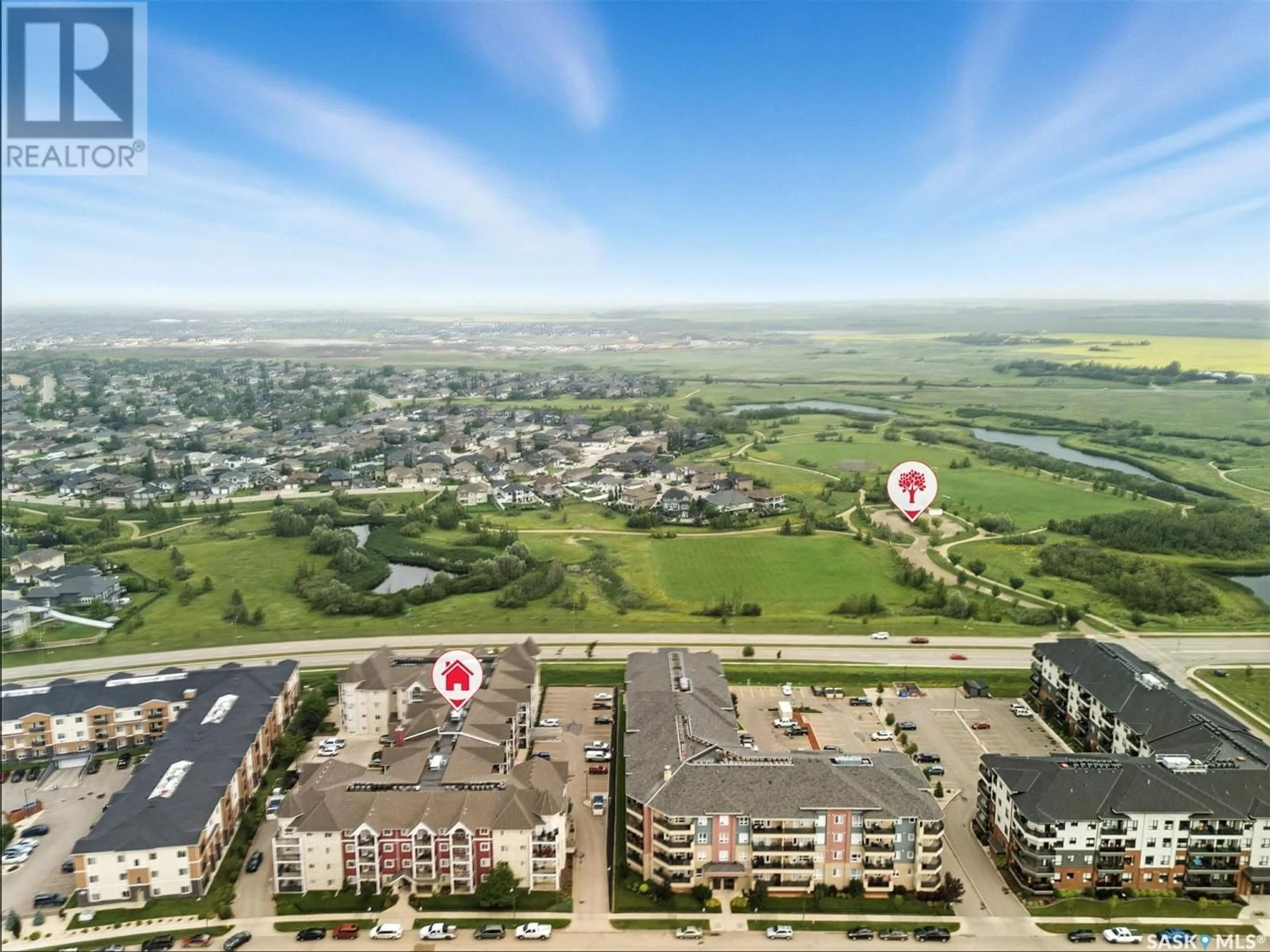 A pic from outside/outdoor area/front of a property/back of a property/a pic from drone, unknown for 314 150 PAWLYCHENKO LANE, Saskatoon Saskatchewan S7B0B4
