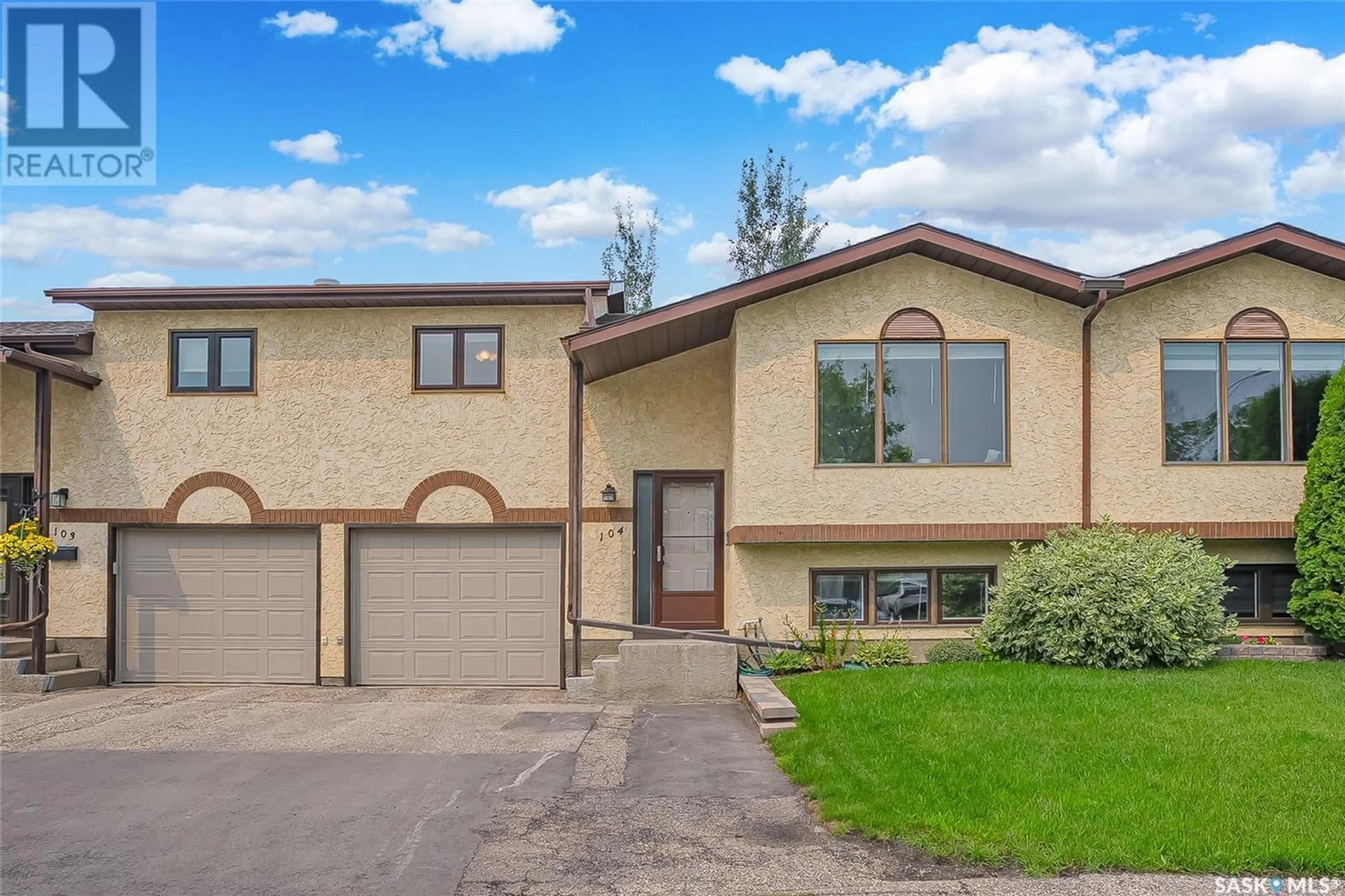 Home with vinyl exterior material, street for 2420 - 104 KENDERDINE ROAD, Saskatoon Saskatchewan S7N4G6