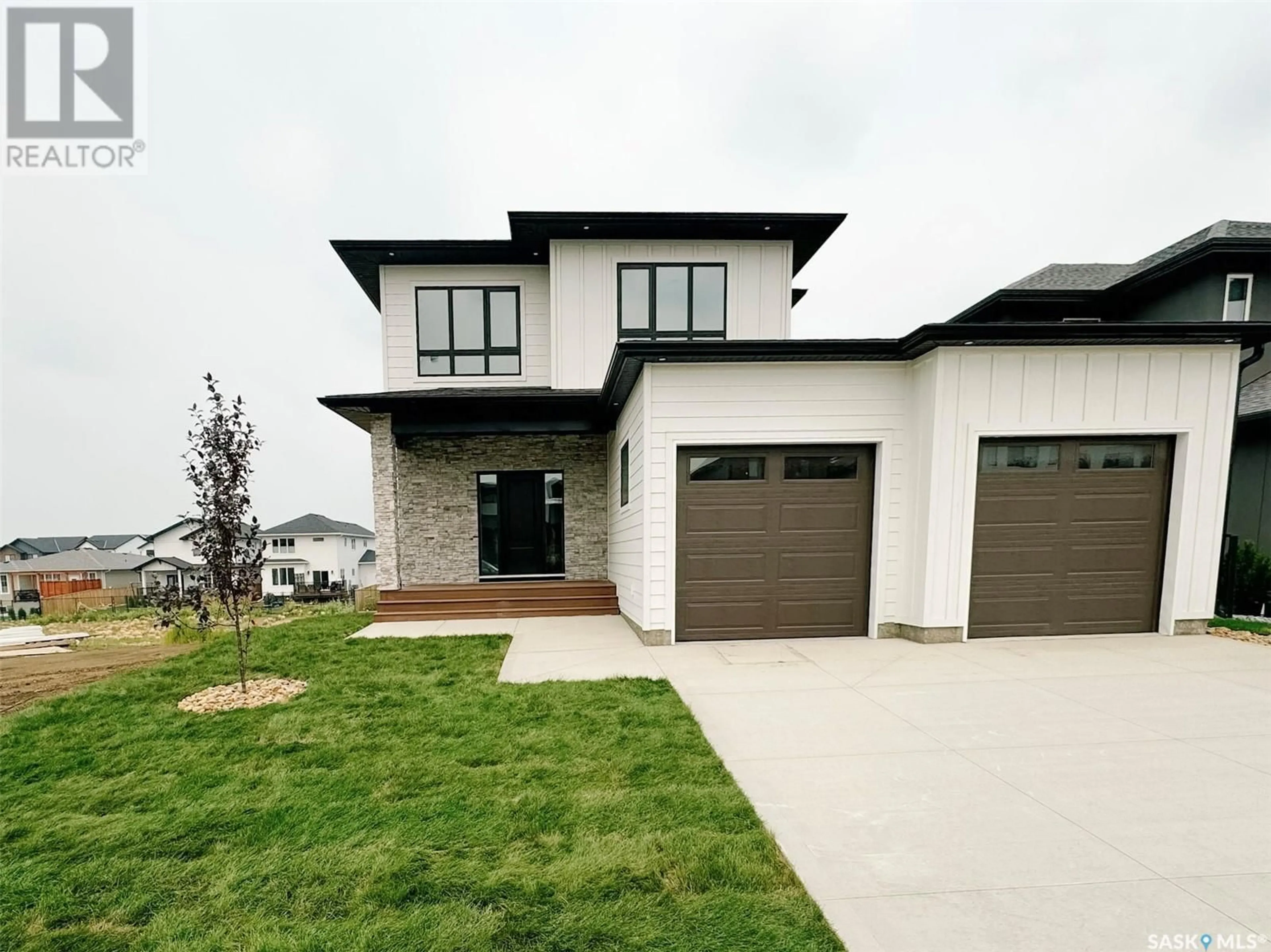 Home with brick exterior material, street for 339 LESKIW BEND, Saskatoon Saskatchewan S7V1X8
