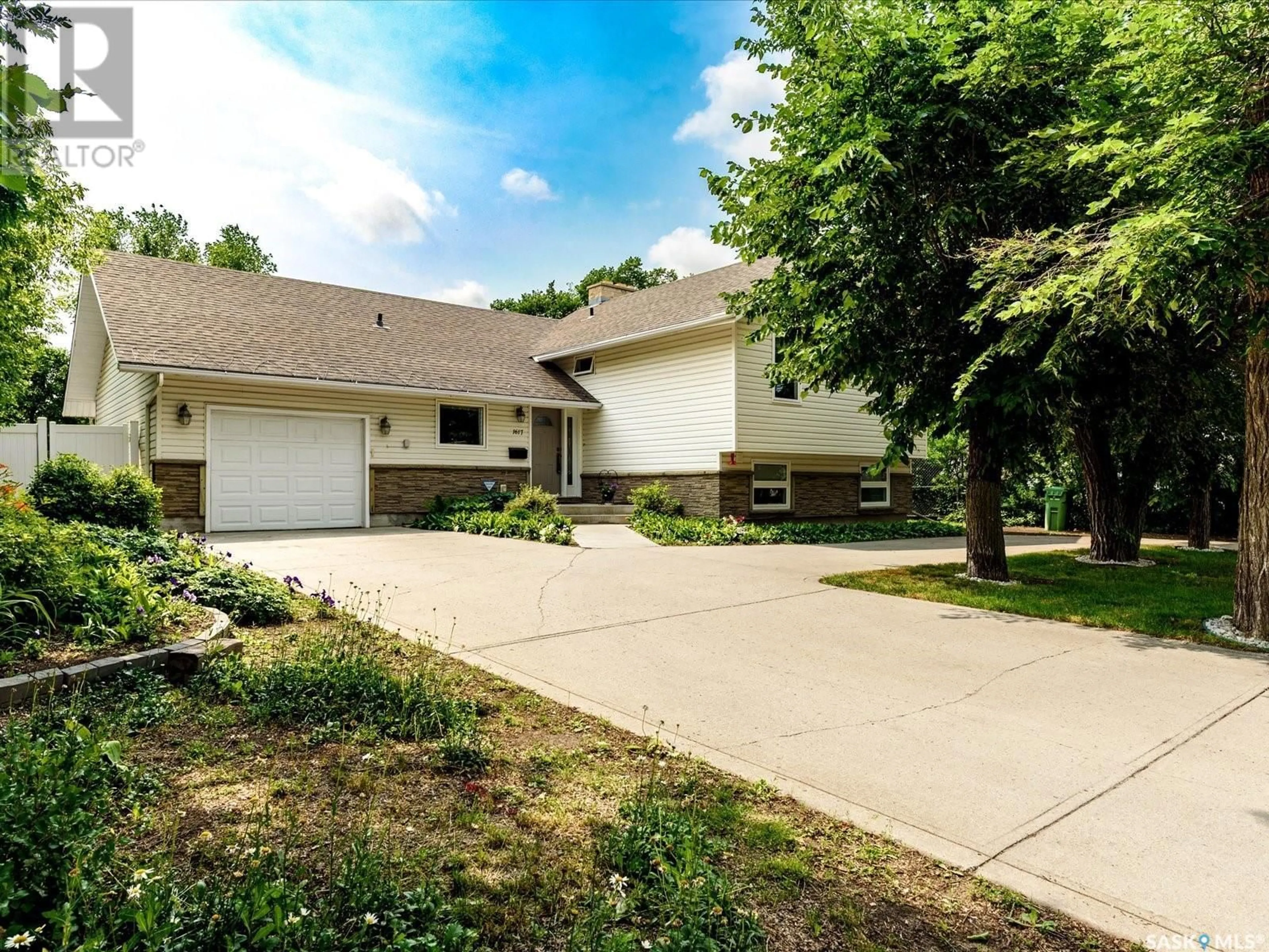 Home with vinyl exterior material, street for 1617 6TH AVENUE, Regina Saskatchewan S4R0M6