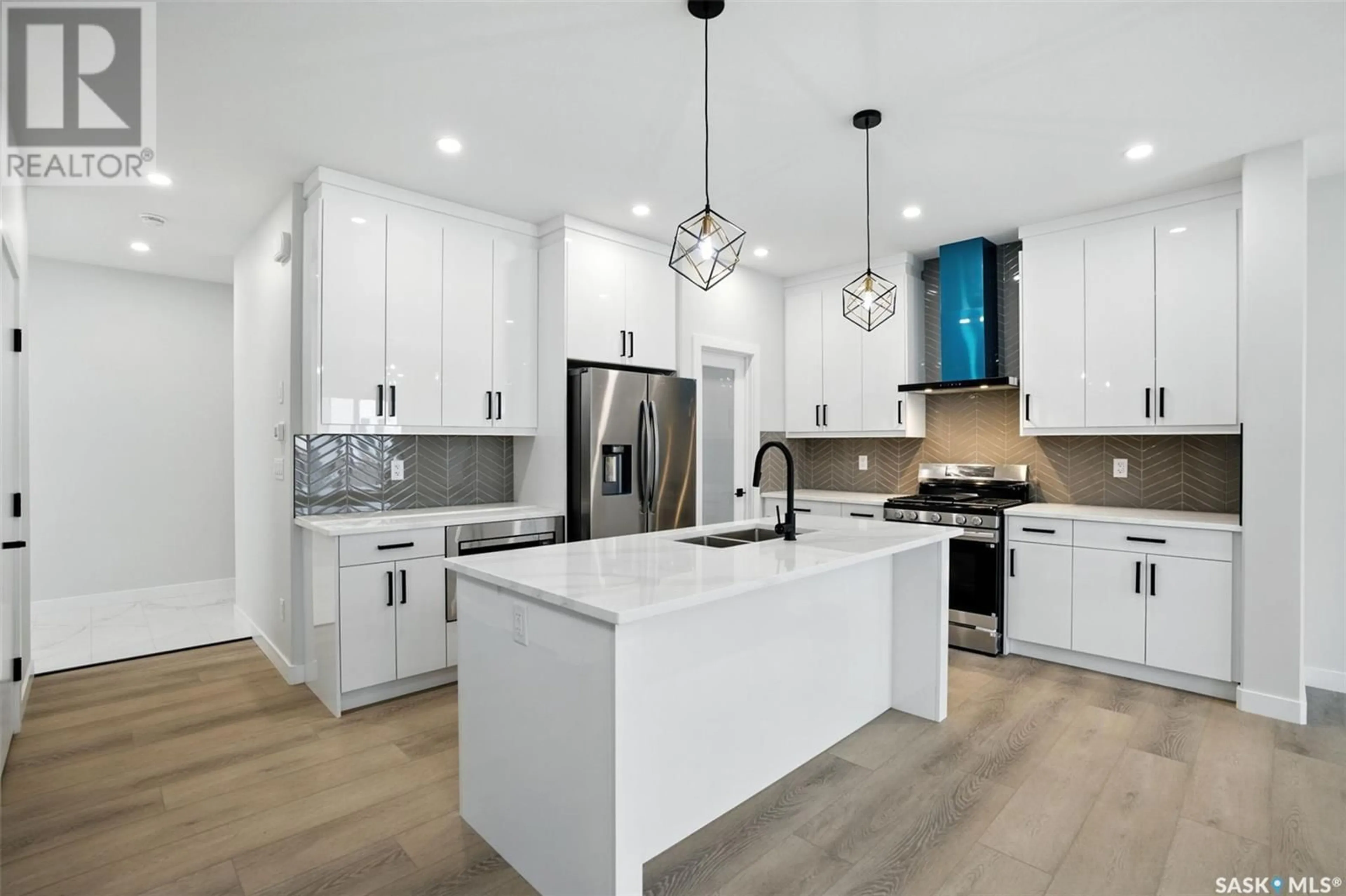 Open concept kitchen, ceramic/tile floor for 218 SHARMA CRESCENT, Saskatoon Saskatchewan S7W0Y4