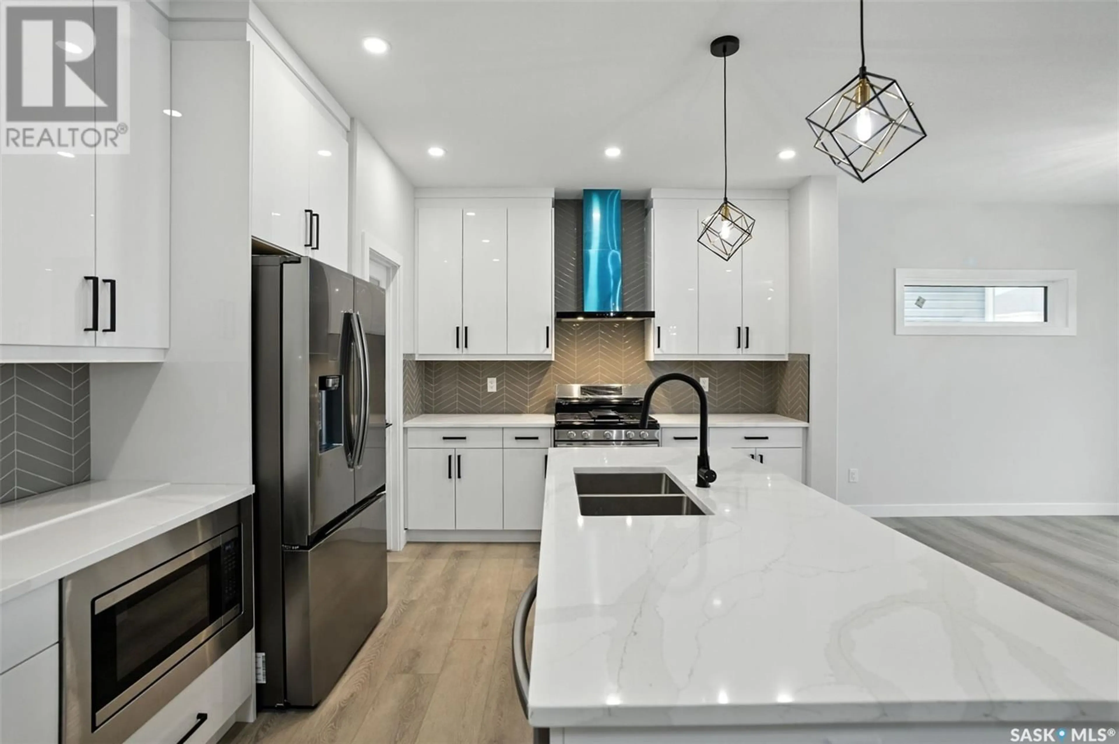 Open concept kitchen, ceramic/tile floor for 218 SHARMA CRESCENT, Saskatoon Saskatchewan S7W0Y4
