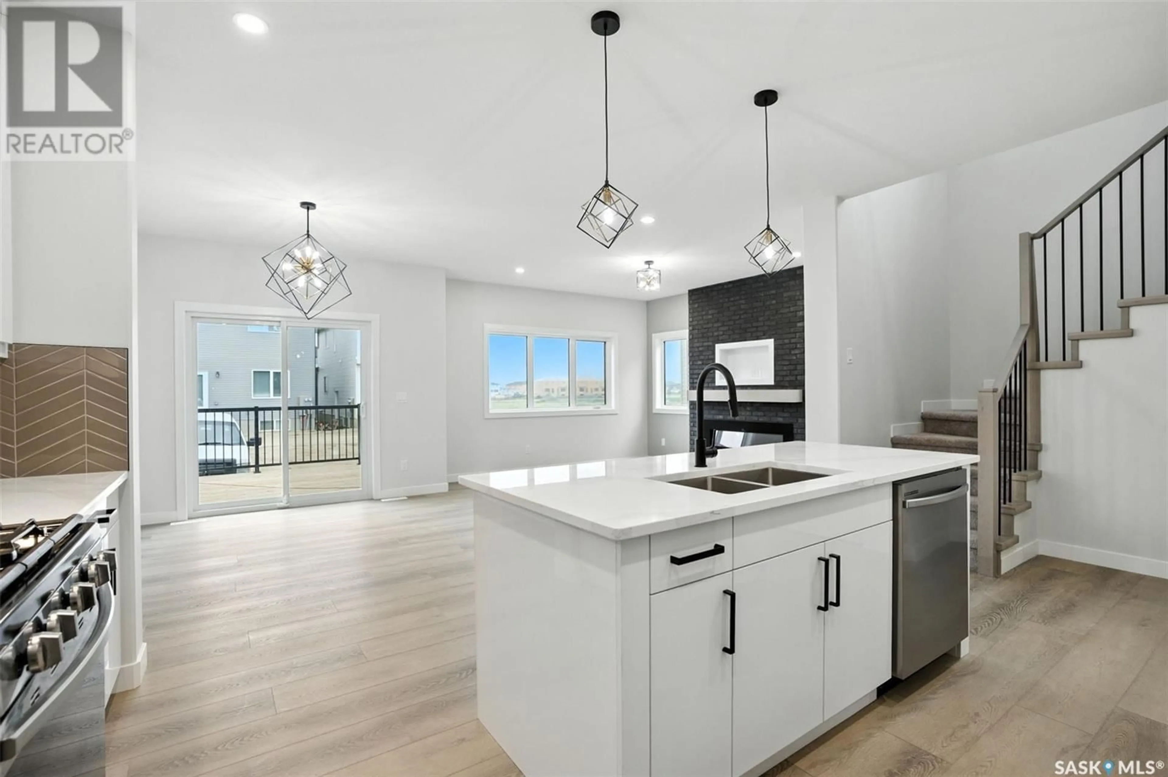 Open concept kitchen, ceramic/tile floor for 218 SHARMA CRESCENT, Saskatoon Saskatchewan S7W0Y4