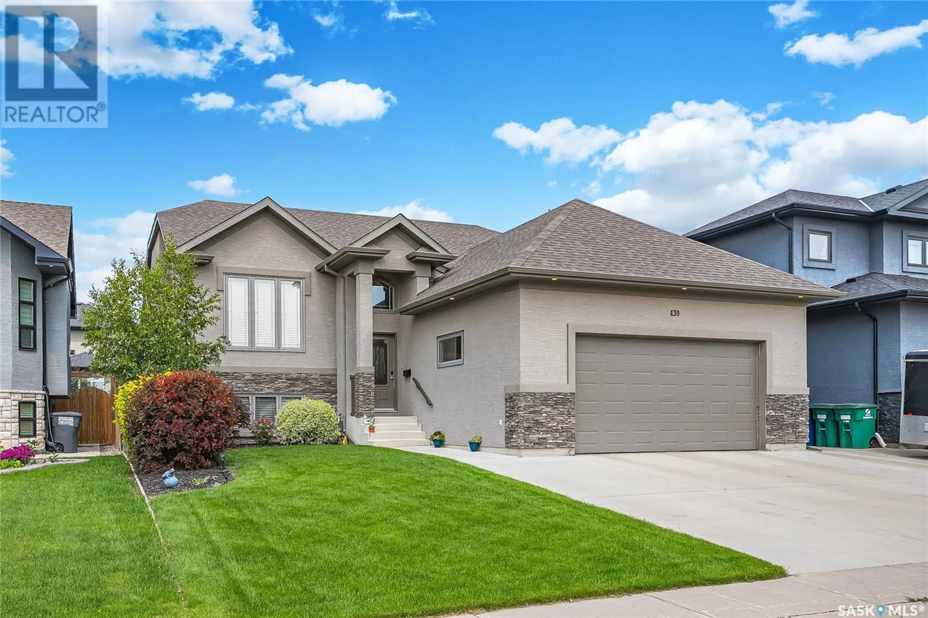 Home with vinyl exterior material, street for 439 WERSCHNER LANE, Saskatoon Saskatchewan S7V0E1