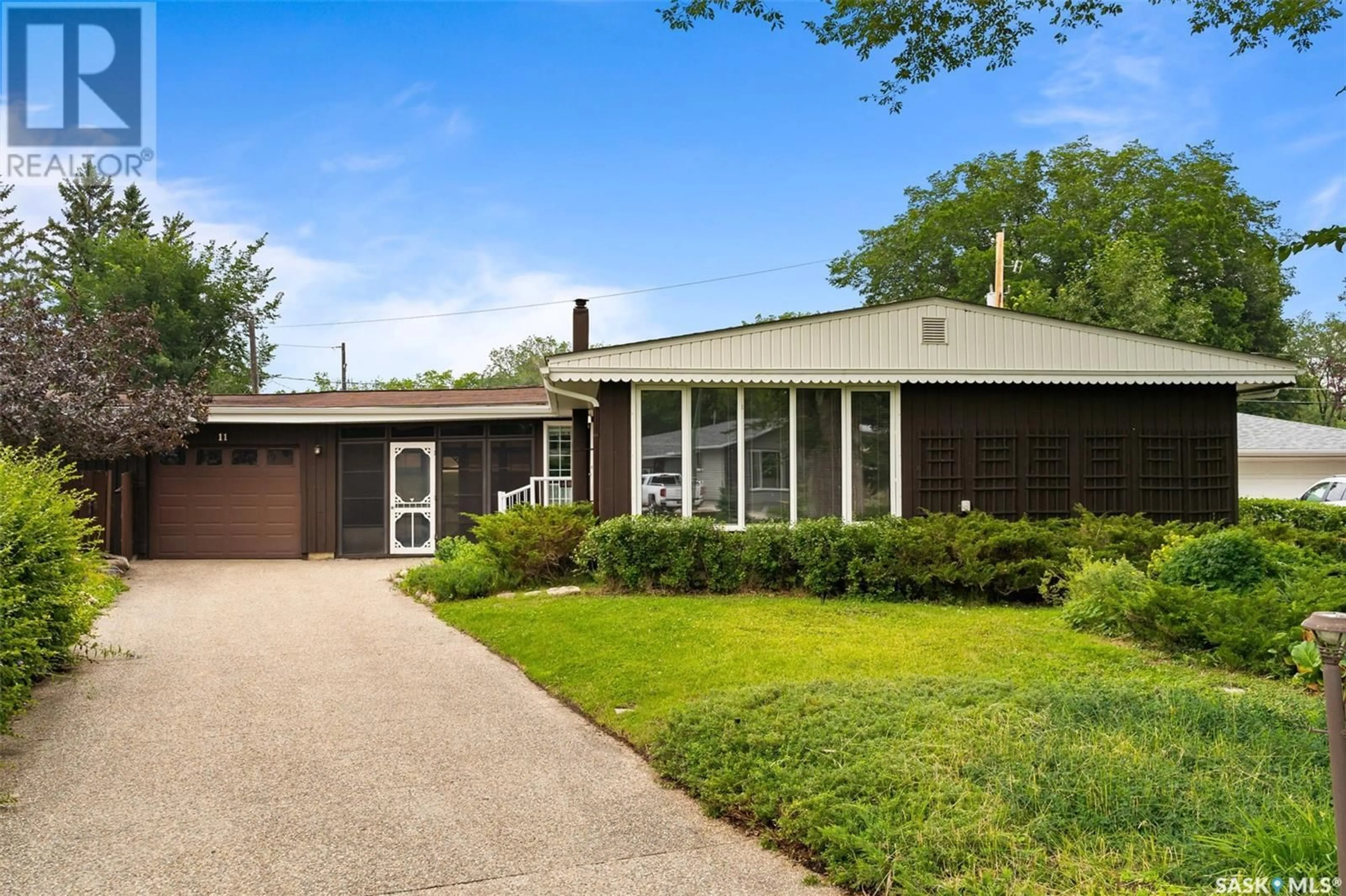 Home with brick exterior material, street for 11 BRIARWOOD PLACE, Regina Saskatchewan S4S5M8