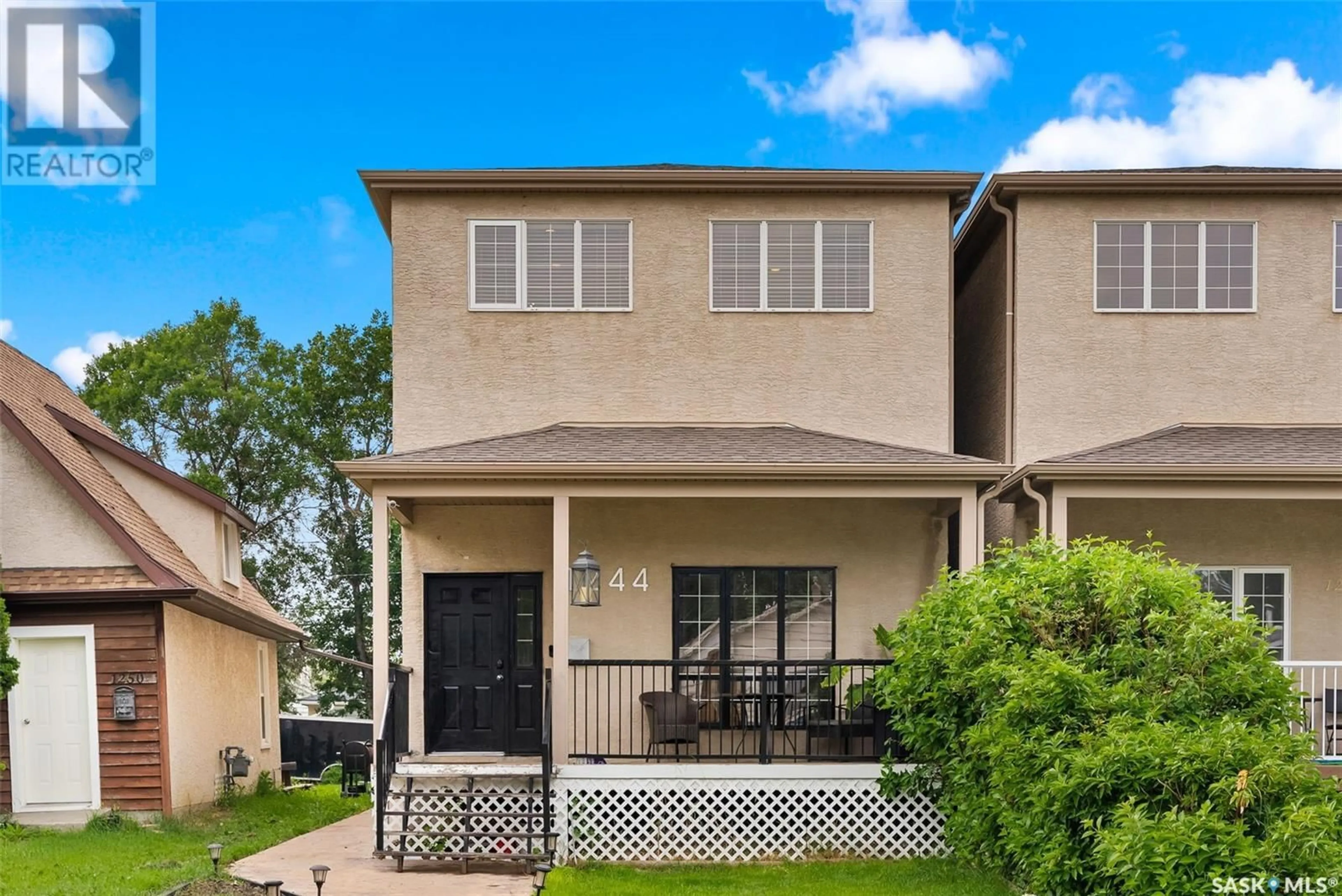 Home with vinyl exterior material, street for 1244 ELLIOTT STREET, Regina Saskatchewan S4N3G1