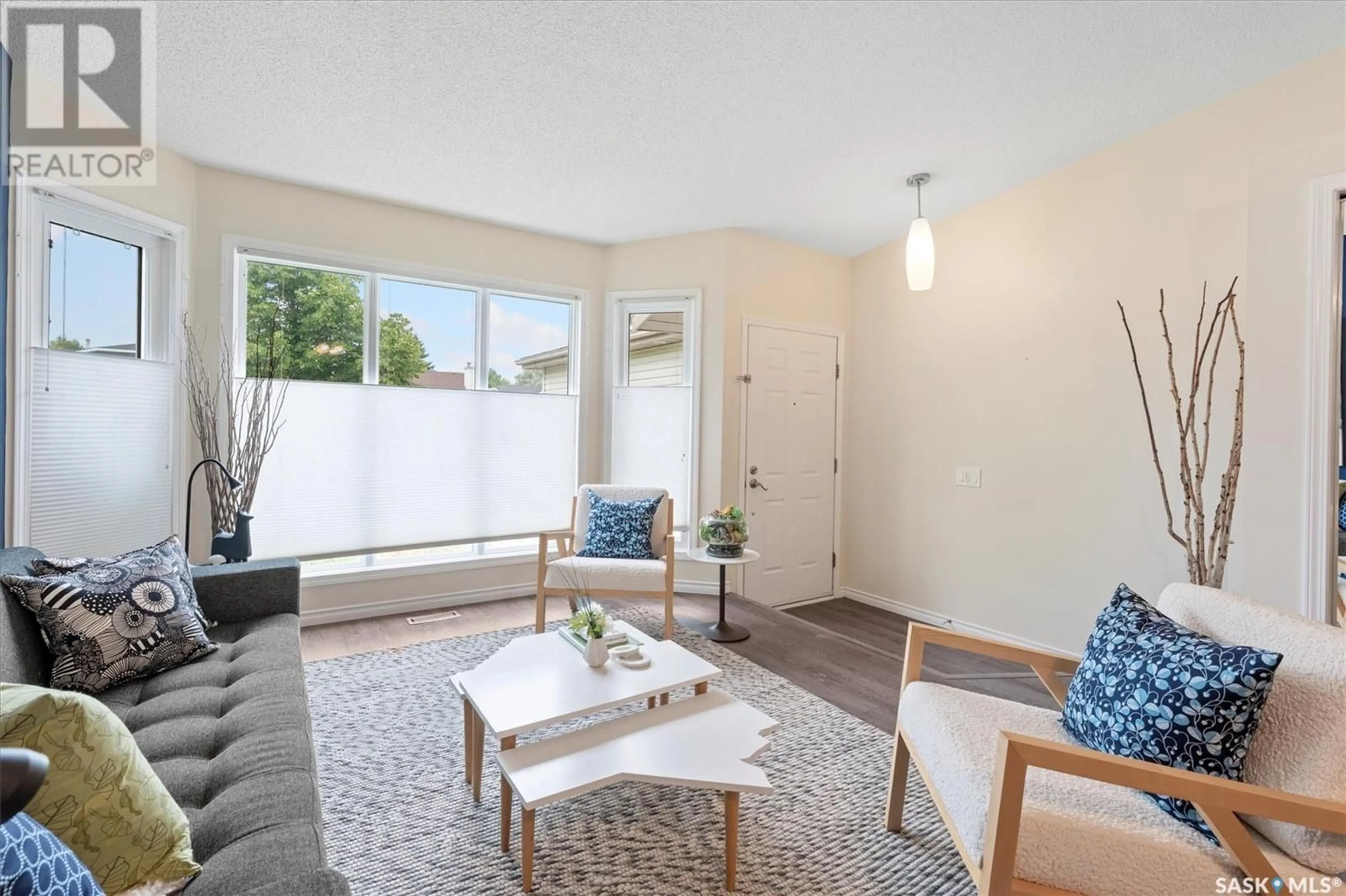 Living room with furniture, unknown for 310 COBEN CRESCENT, Saskatoon Saskatchewan S7S1B3