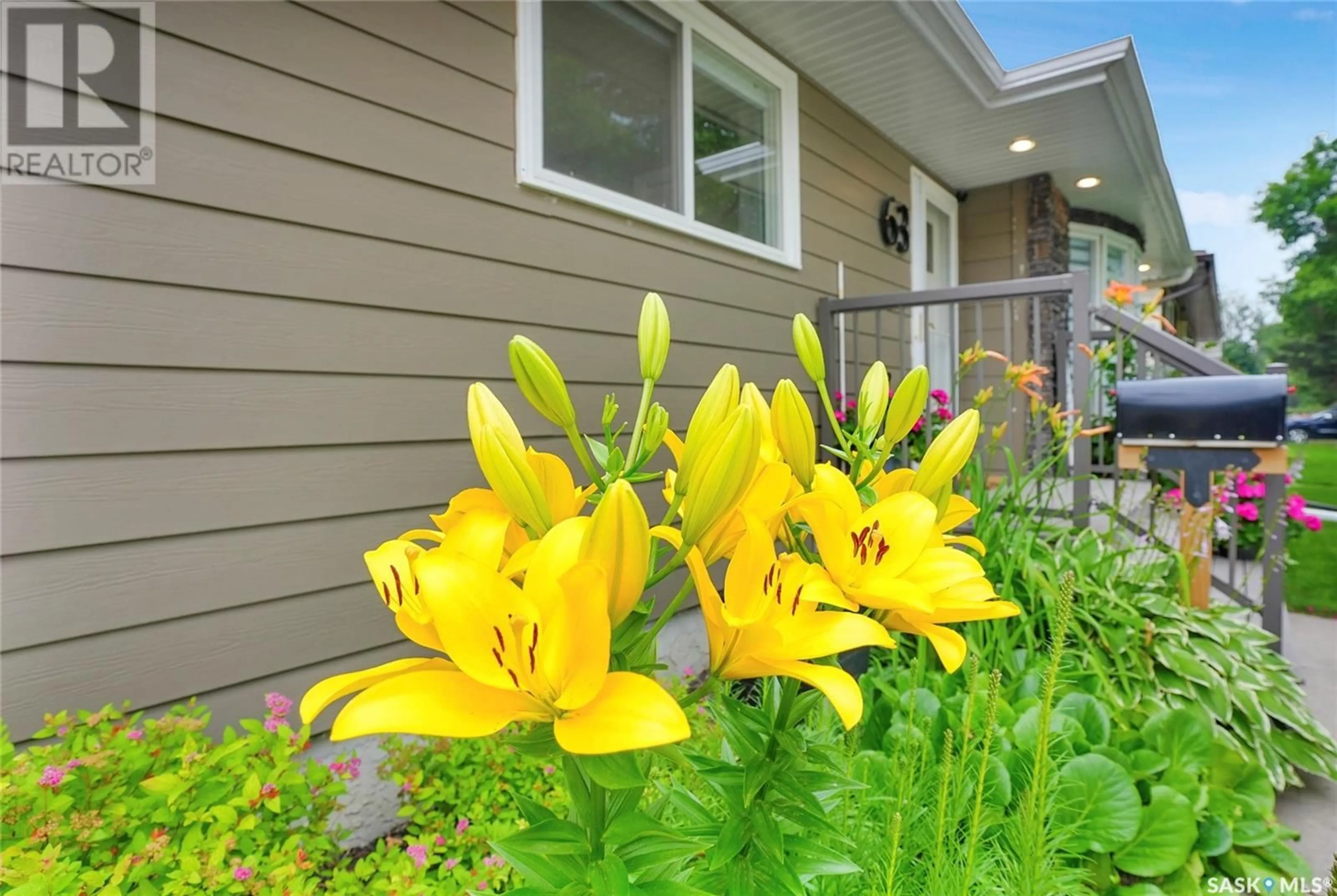 Home with vinyl exterior material, street for 63 WILLISTON DRIVE, Regina Saskatchewan S4X1C3