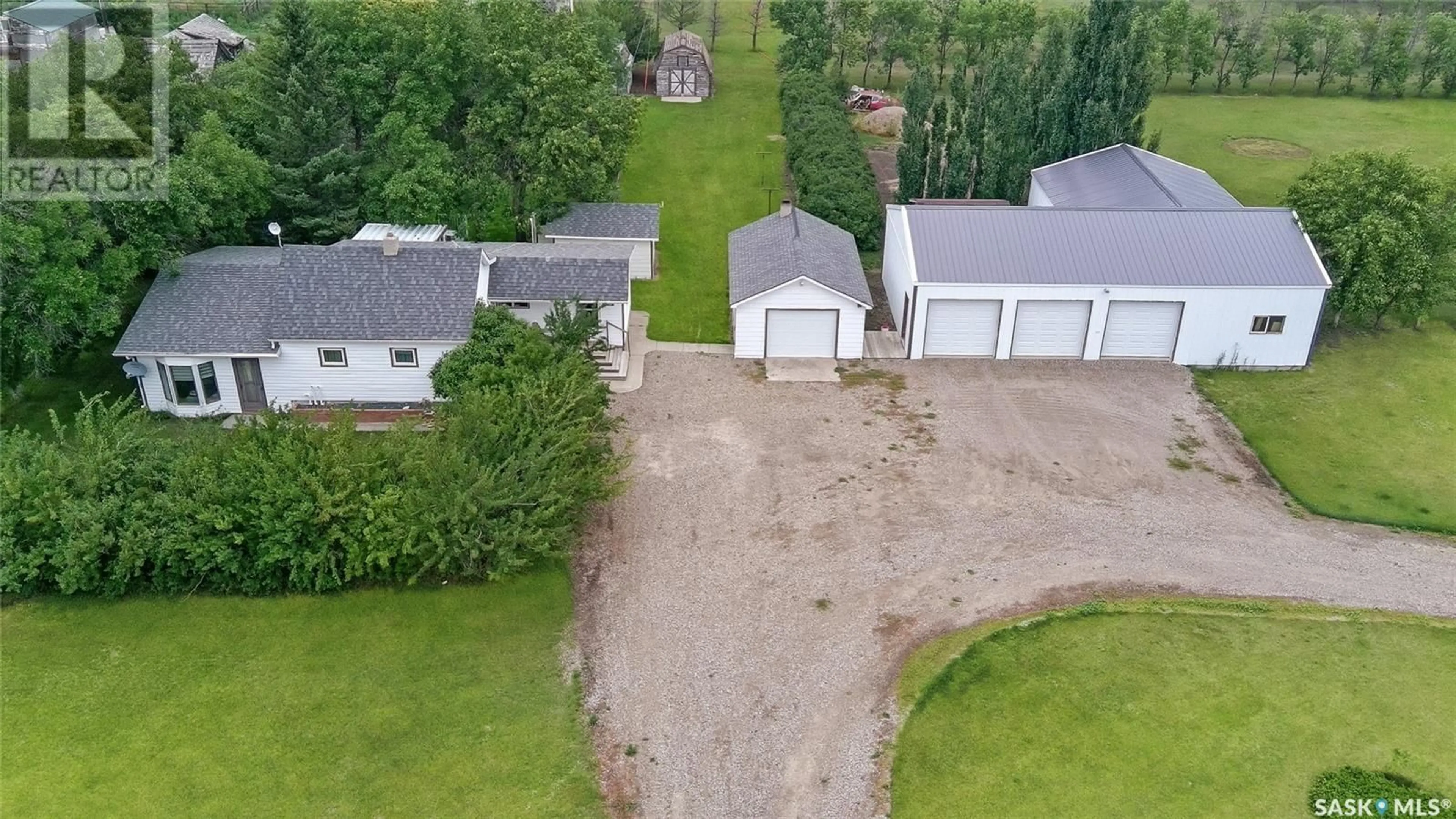 A pic from outside/outdoor area/front of a property/back of a property/a pic from drone, street for FEHR ACREAGE, Coulee Rm No. 136 Saskatchewan S9H4J8