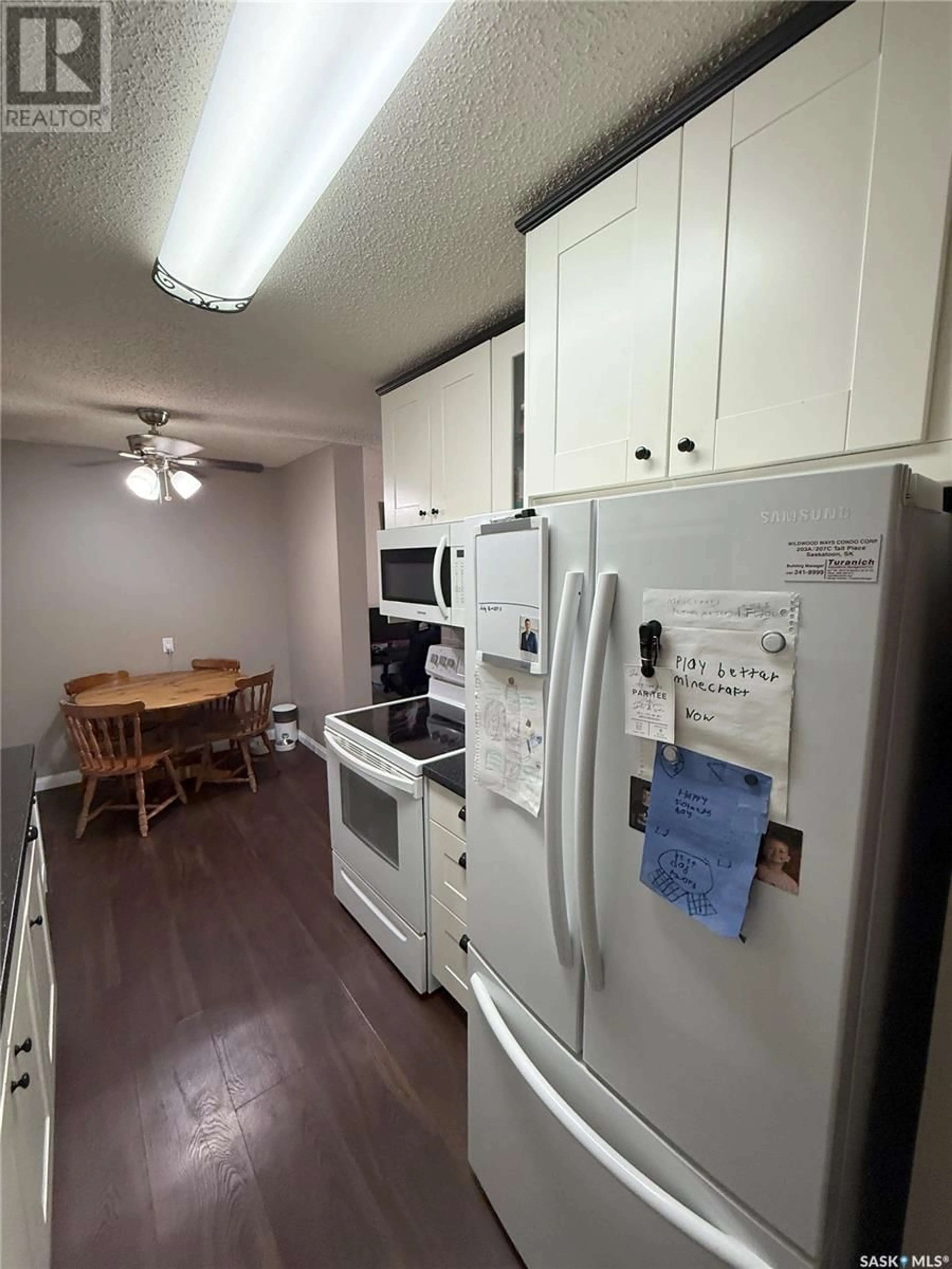 Standard kitchen, wood/laminate floor for 207C - 312 TAIT PLACE, Saskatoon Saskatchewan S7H5L8