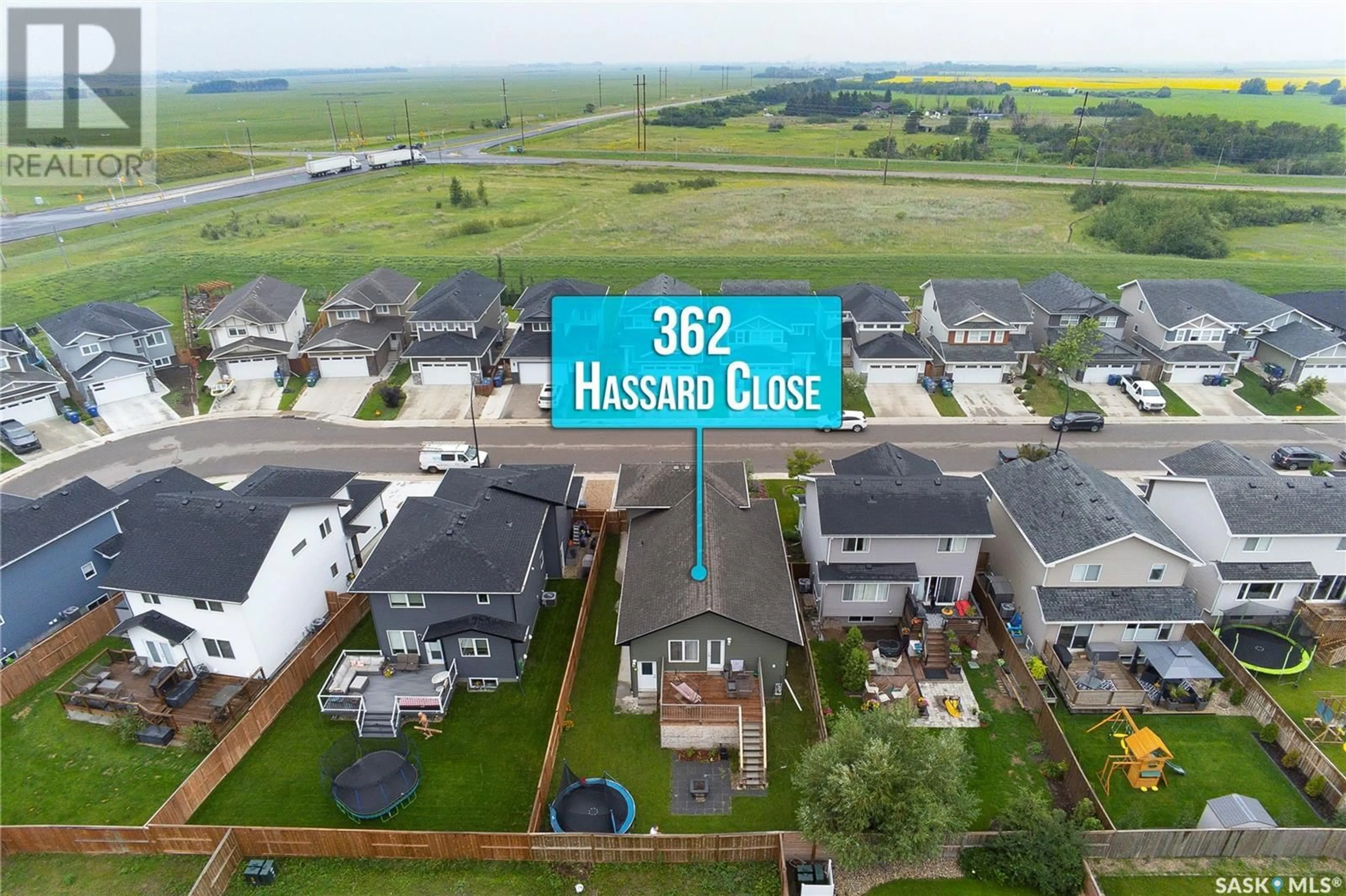 A pic from outside/outdoor area/front of a property/back of a property/a pic from drone, street for 362 HASSARD CLOSE, Saskatoon Saskatchewan S7L4Y7