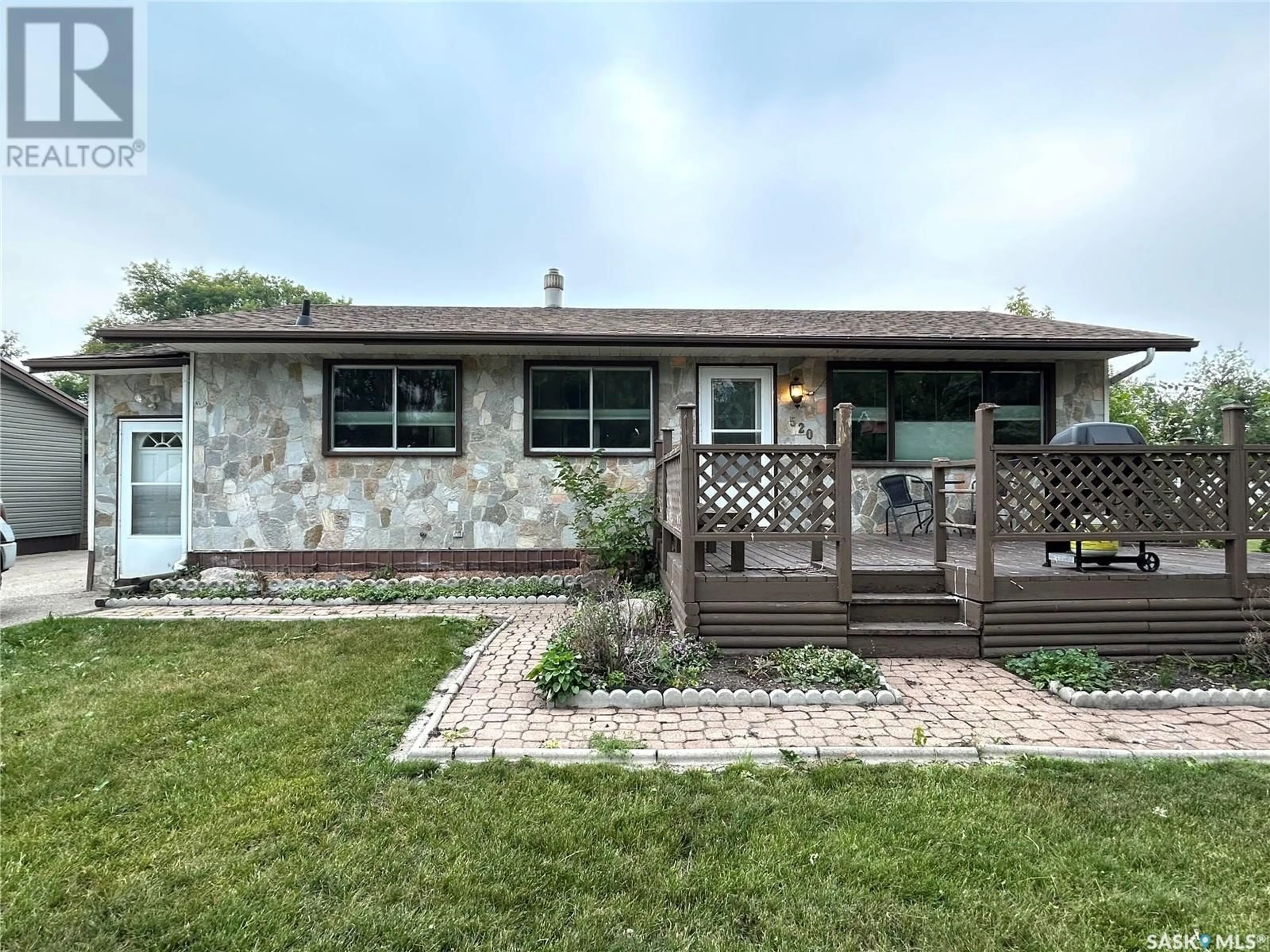 Home with vinyl exterior material, street for 520 3RD AVENUE, Esterhazy Saskatchewan S0A0X0