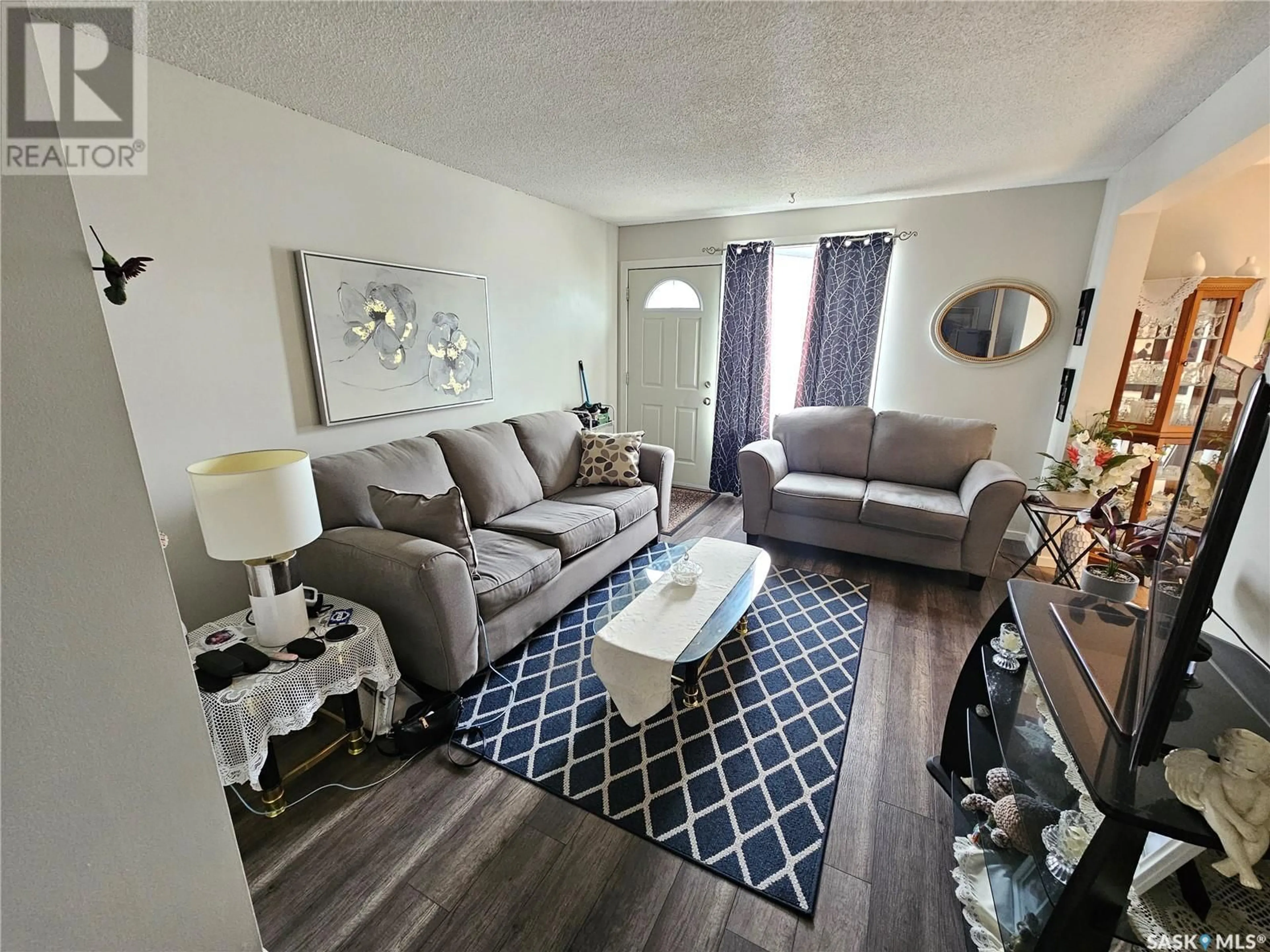 Living room with furniture, unknown for 10 1292 GORDON ROAD, Moose Jaw Saskatchewan S6H3E5