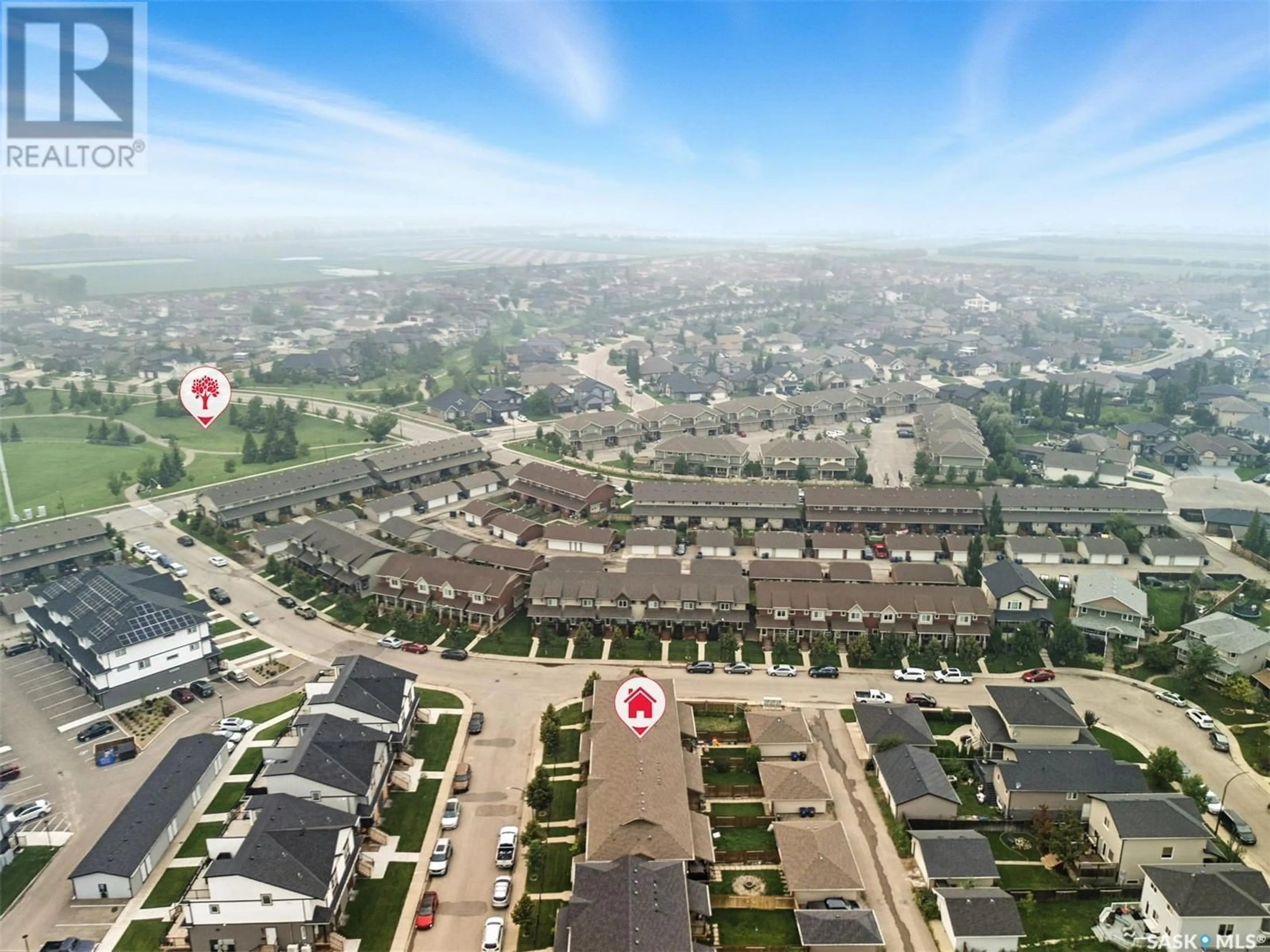 A pic from outside/outdoor area/front of a property/back of a property/a pic from drone, street for 380 WILLOWGROVE LANE, Saskatoon Saskatchewan S7W0E5