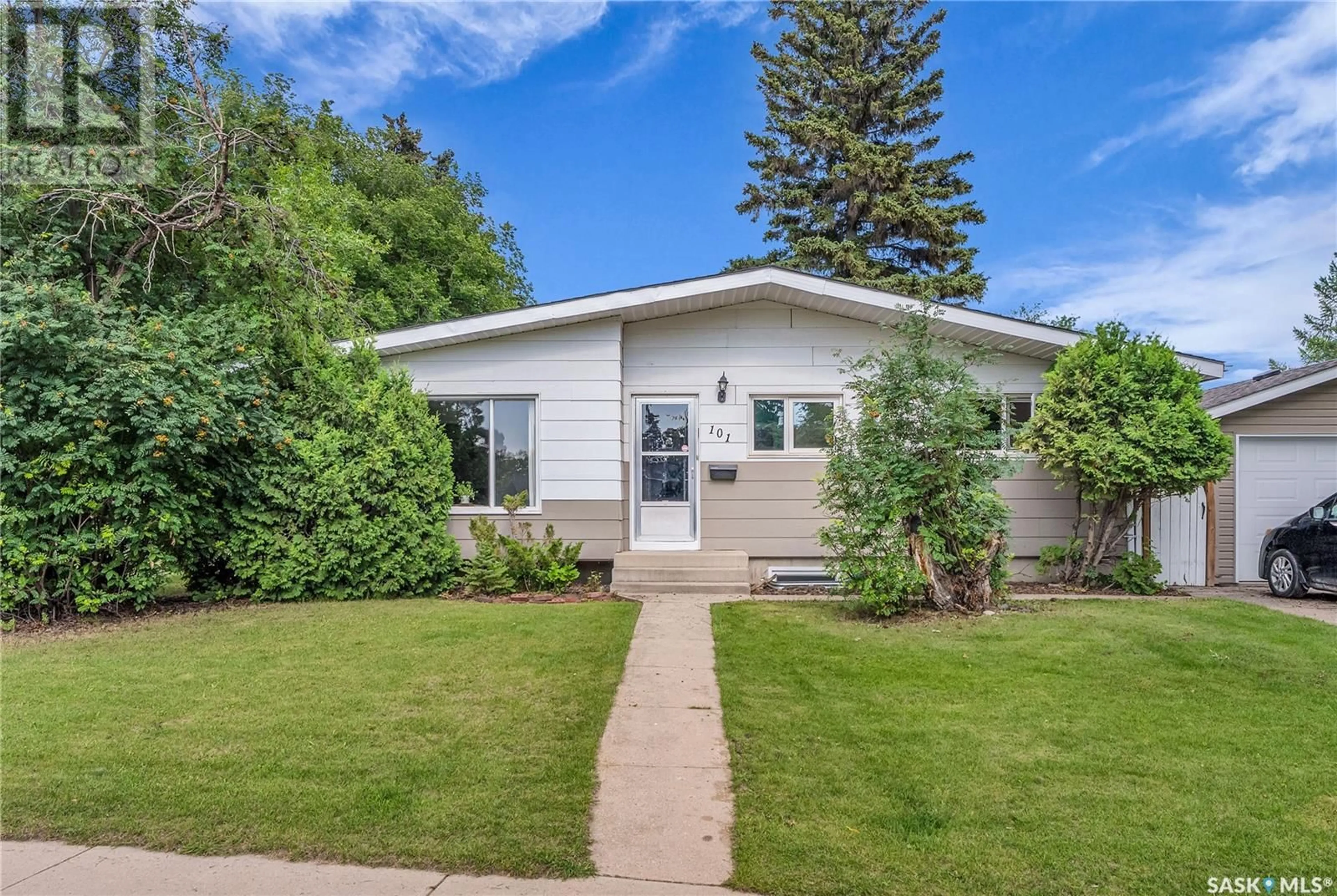 Home with vinyl exterior material, street for 101 SALISBURY DRIVE, Saskatoon Saskatchewan S7H4B7