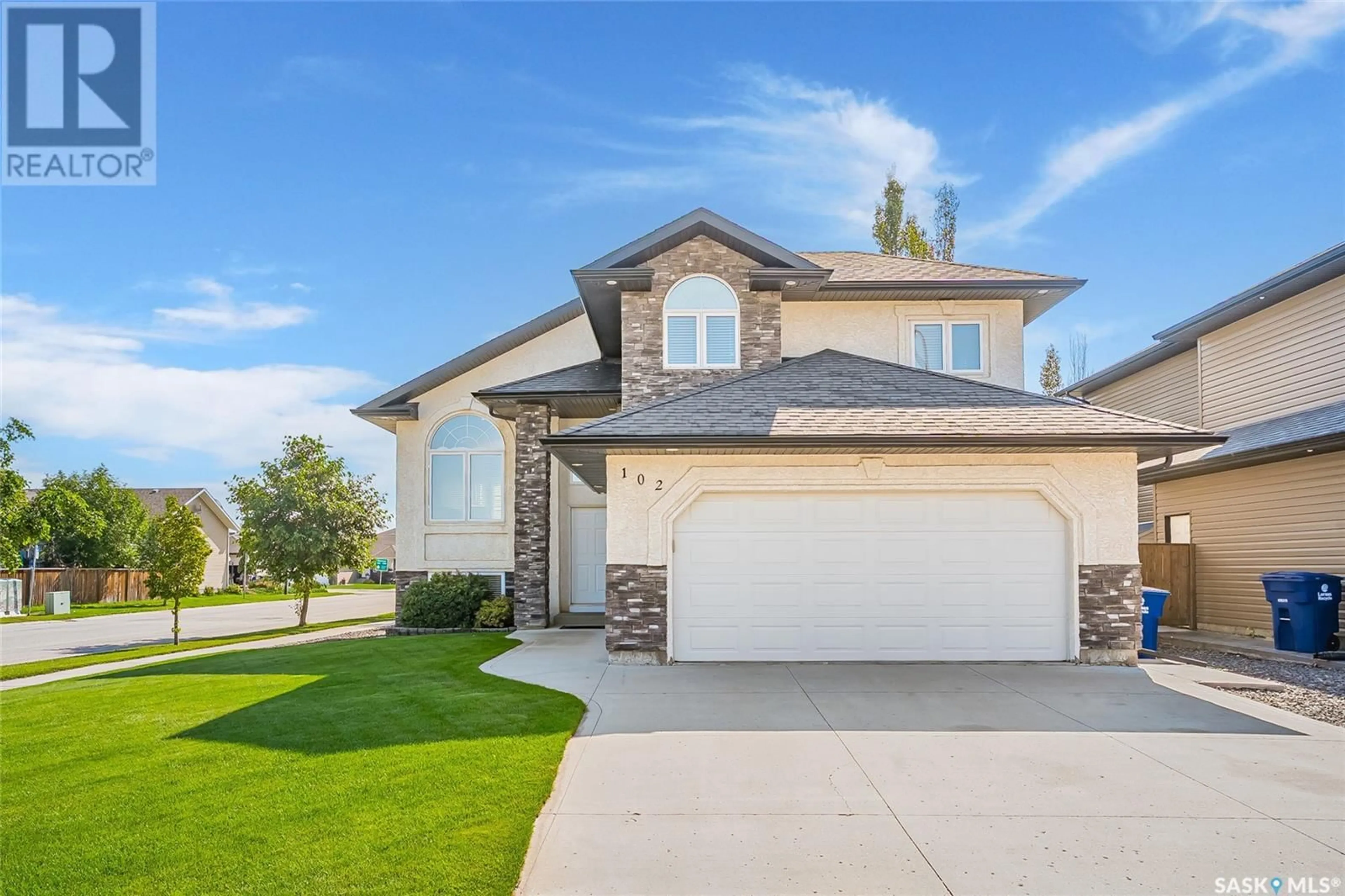 Home with vinyl exterior material, street for 102 WILKINS CRESCENT, Saskatoon Saskatchewan S7W0C5