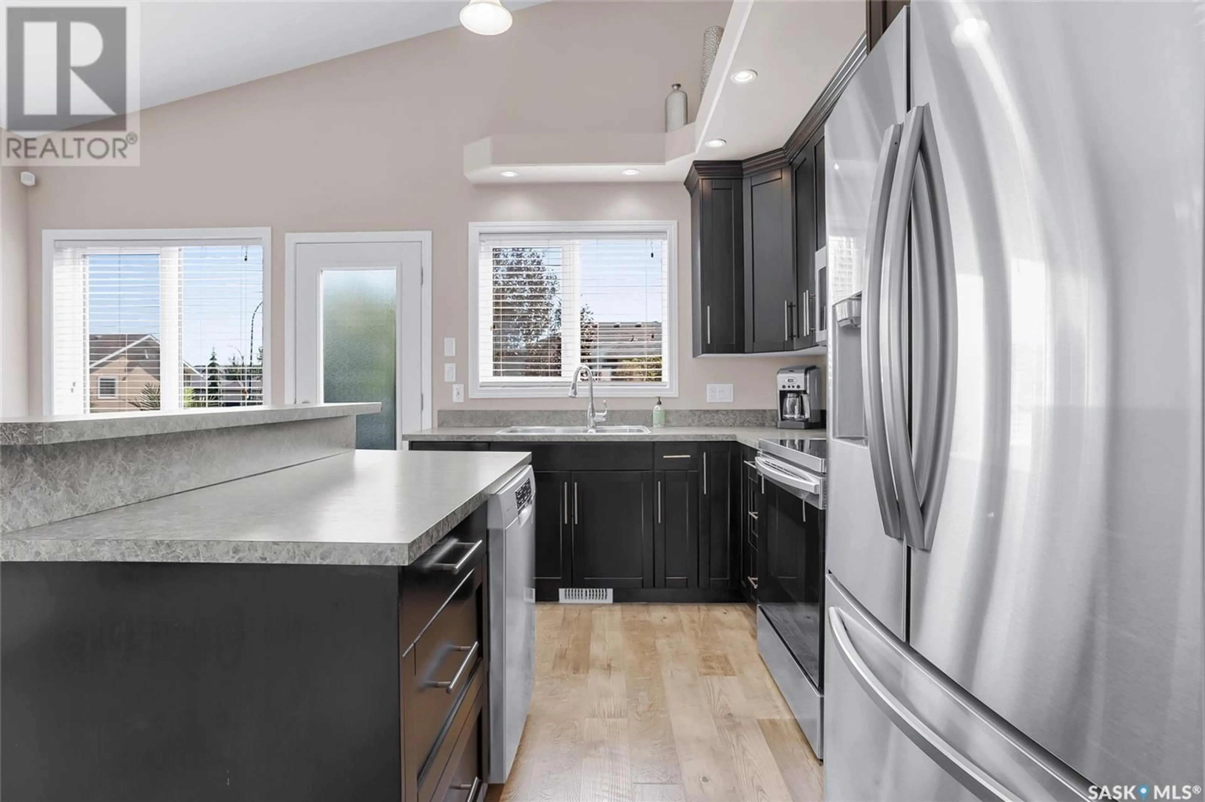 Open concept kitchen, unknown for 102 WILKINS CRESCENT, Saskatoon Saskatchewan S7W0C5