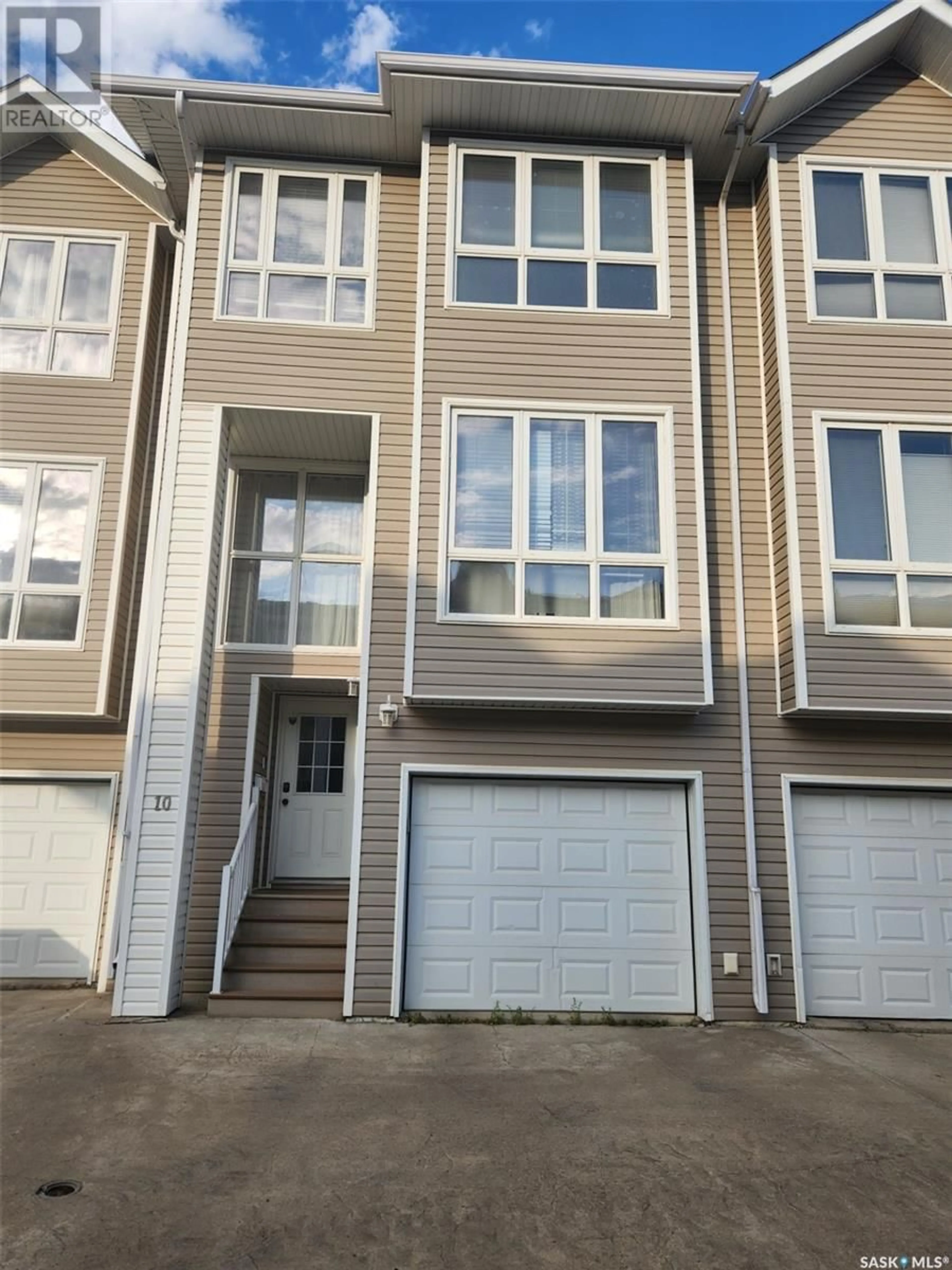 Home with vinyl exterior material, street for 10 697 SUN VALLEY DRIVE, Estevan Saskatchewan S4A2X7