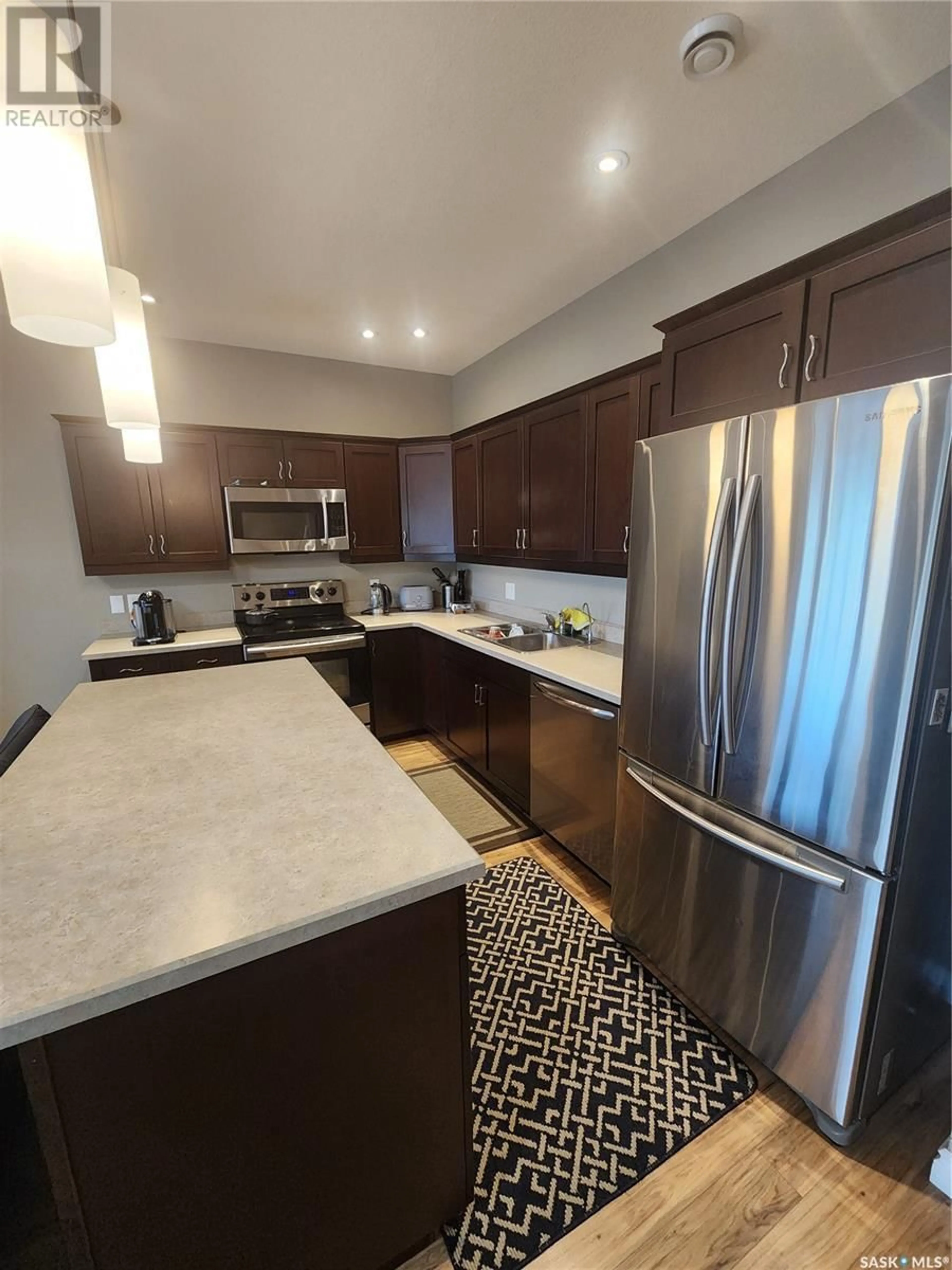 Open concept kitchen, unknown for 10 697 SUN VALLEY DRIVE, Estevan Saskatchewan S4A2X7
