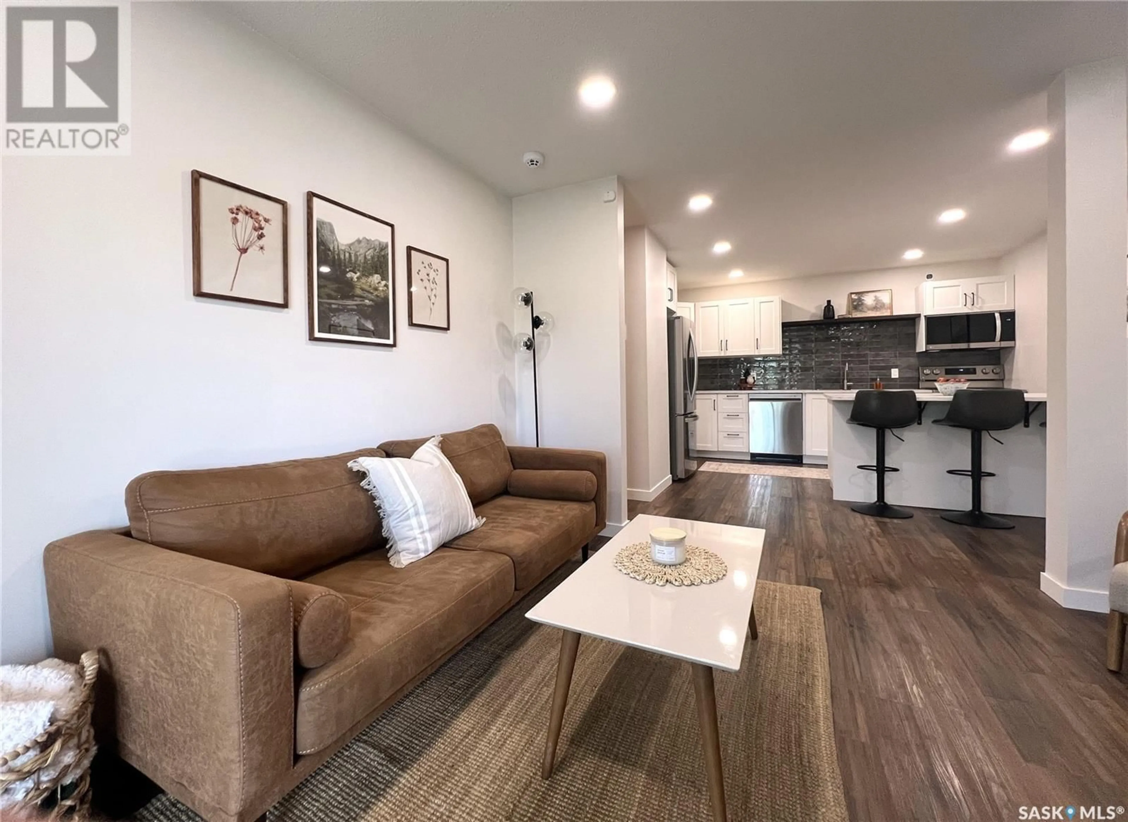 Living room with furniture, unknown for 306 - 307 PERKINS STREET, Estevan Saskatchewan S4A2K1