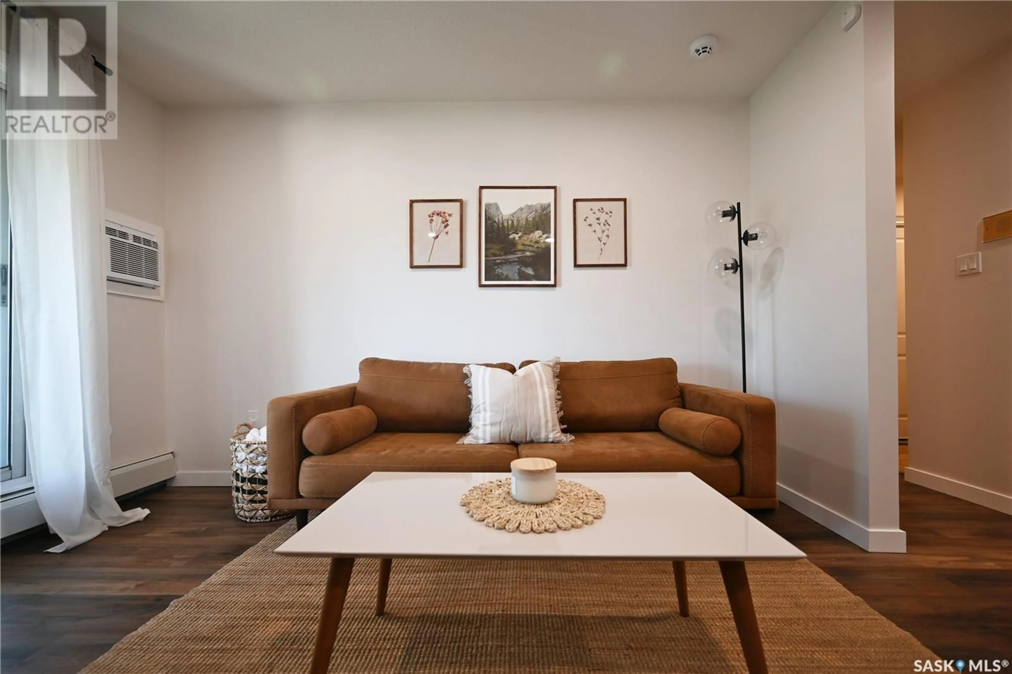 Living room with furniture, unknown for 306 - 307 PERKINS STREET, Estevan Saskatchewan S4A2K1