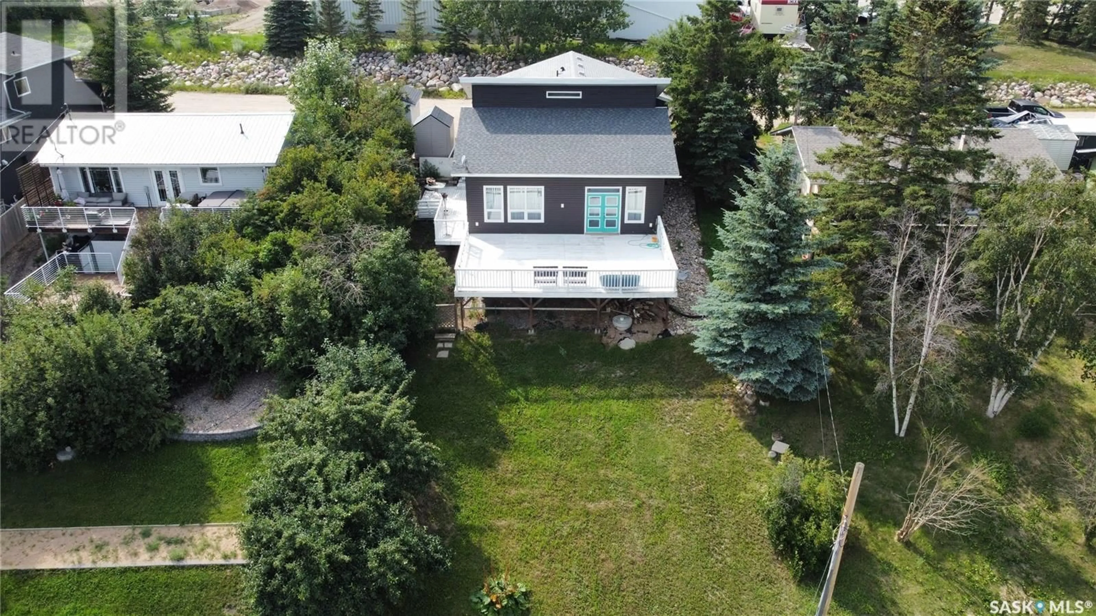 A pic from outside/outdoor area/front of a property/back of a property/a pic from drone, street for 32 MAWSON DRIVE, Shields Saskatchewan S7C0A2