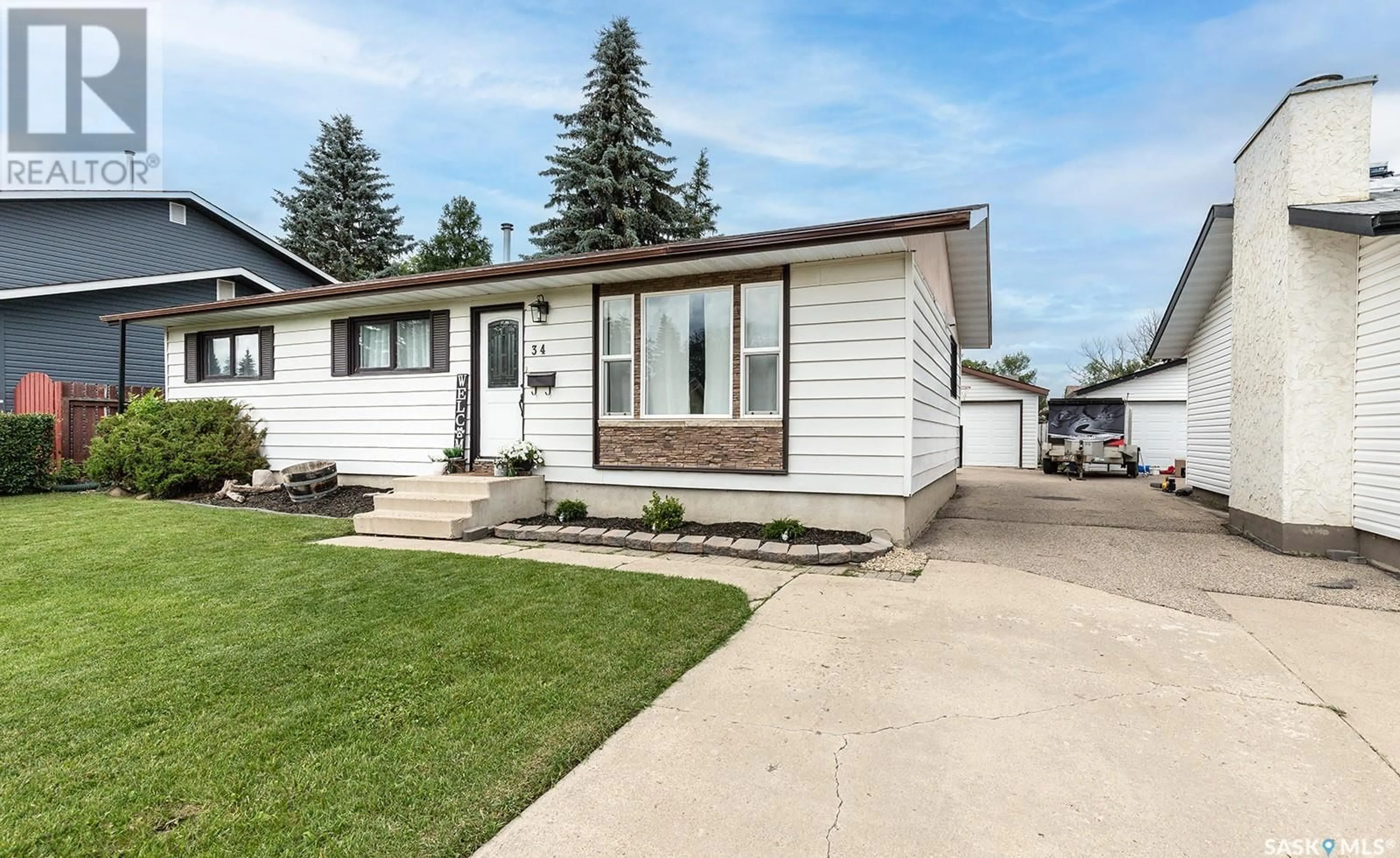 Home with vinyl exterior material, street for 34 BEURLING CRESCENT, Saskatoon Saskatchewan S7H0T6