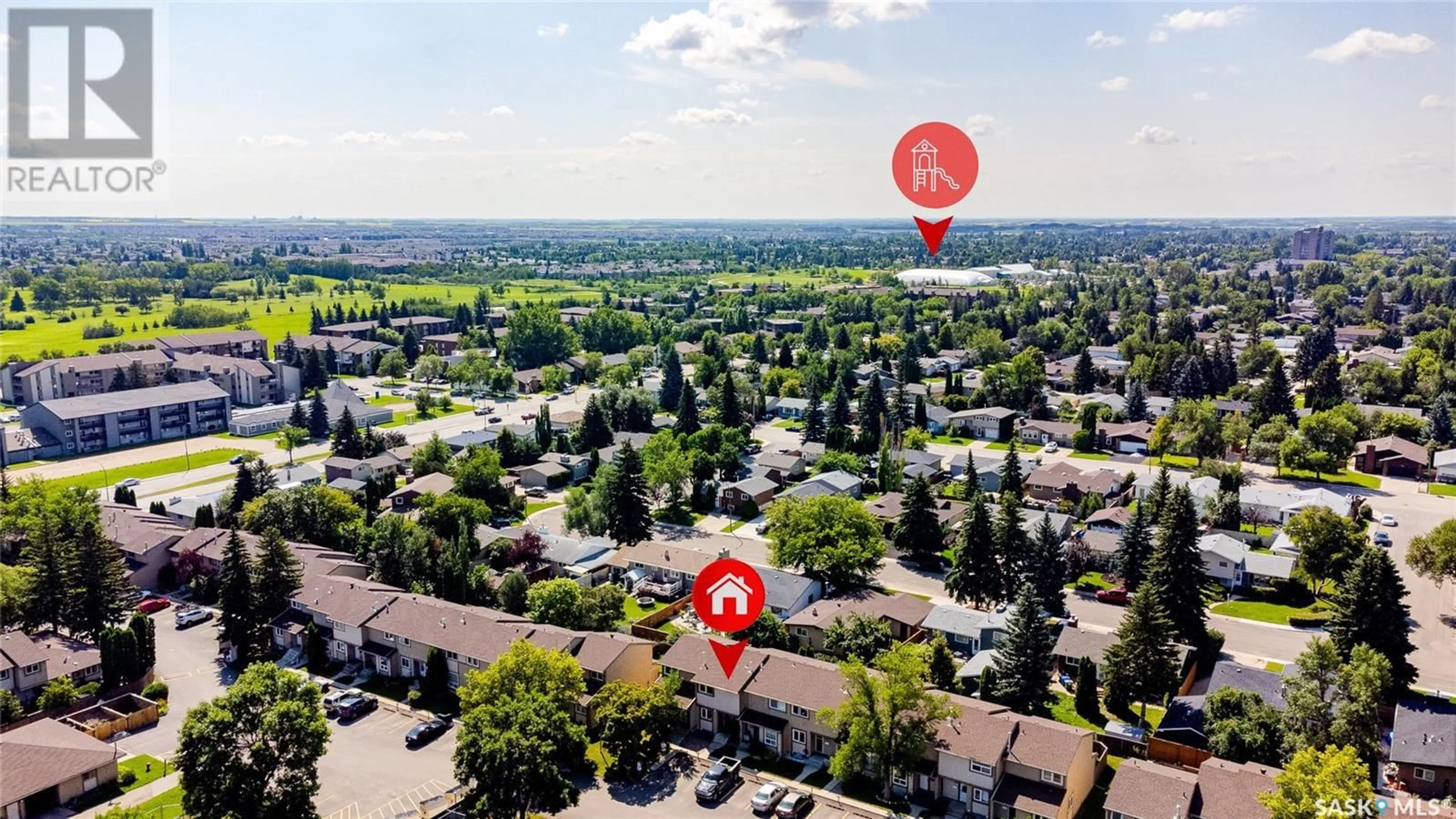 A pic from outside/outdoor area/front of a property/back of a property/a pic from drone, street for 153 1128 MCKERCHER DRIVE, Saskatoon Saskatchewan S7H4Y7