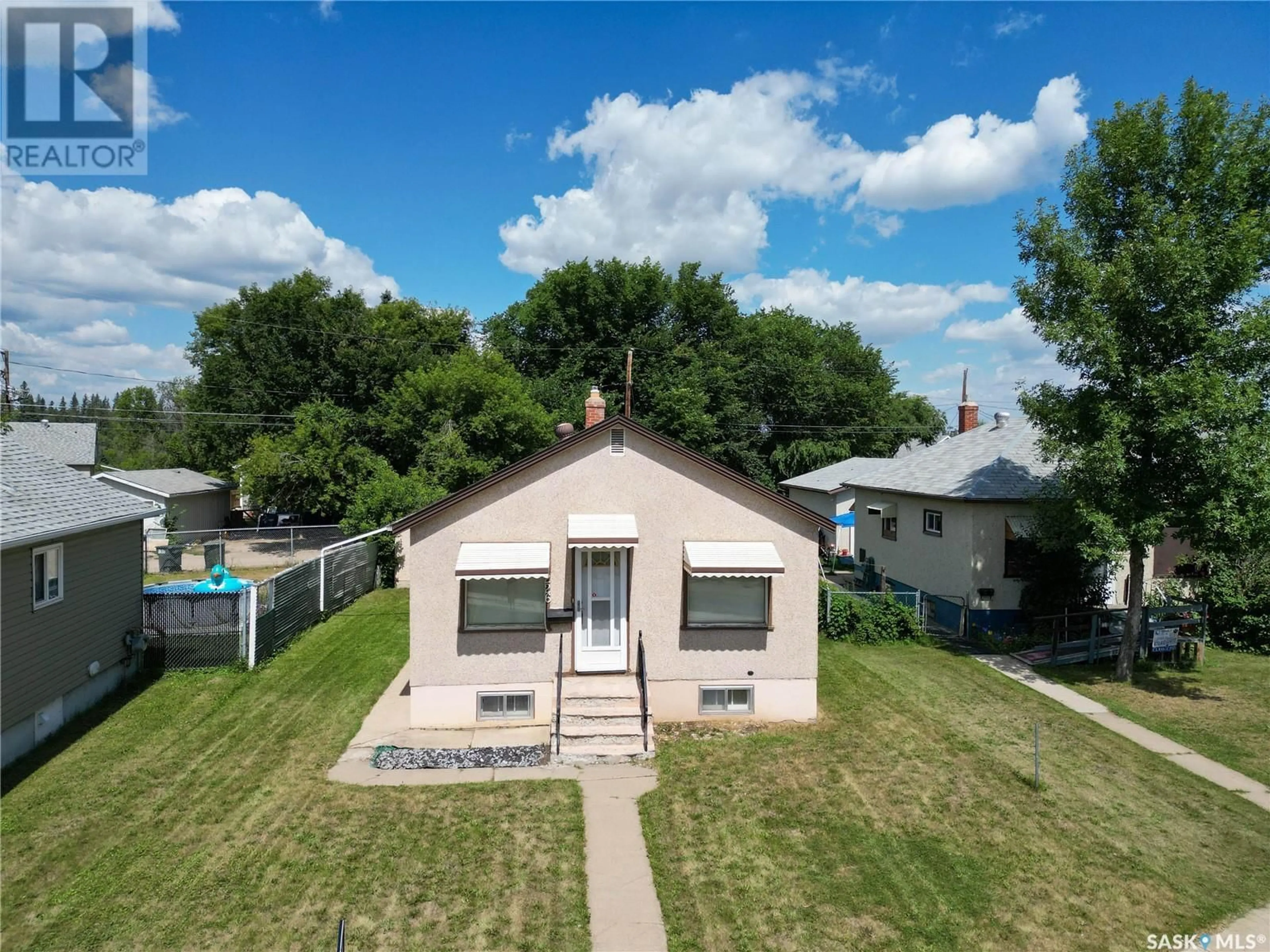 A pic from outside/outdoor area/front of a property/back of a property/a pic from drone, street for 226 6TH STREET, Prince Albert Saskatchewan S6V0M8
