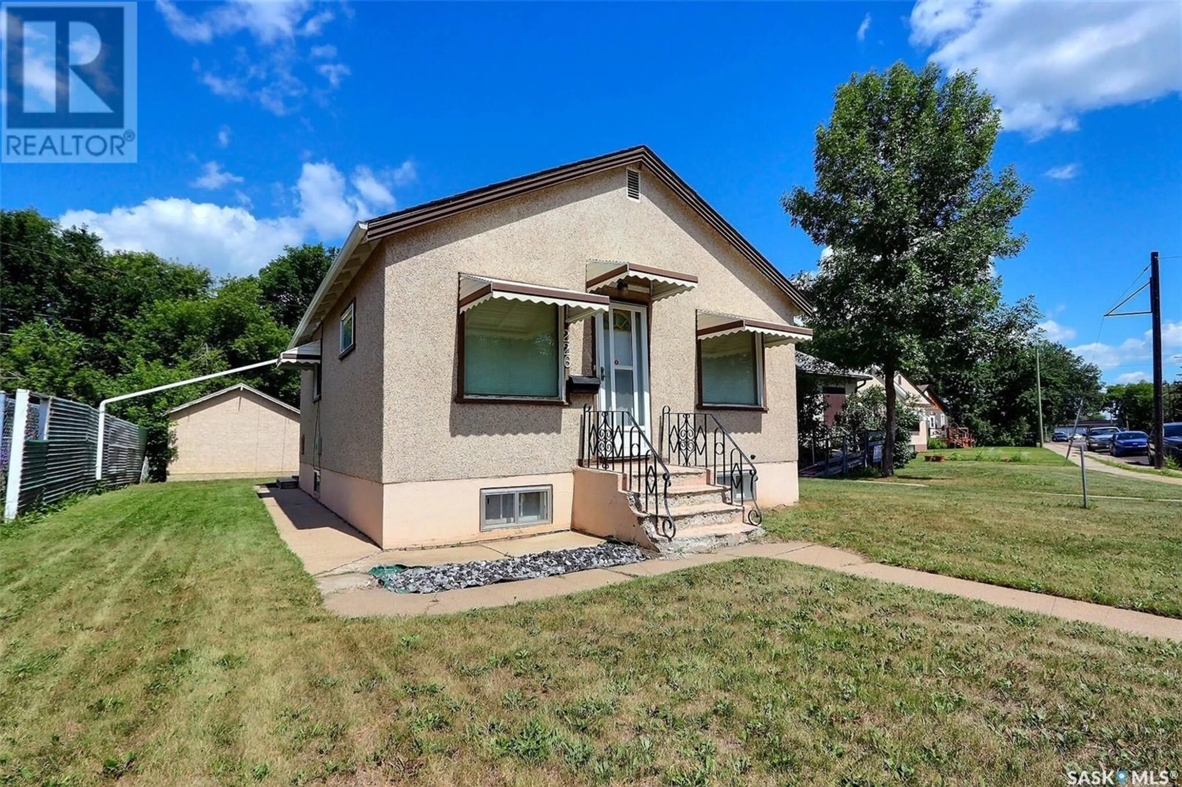 Home with vinyl exterior material, street for 226 6TH STREET, Prince Albert Saskatchewan S6V0M8