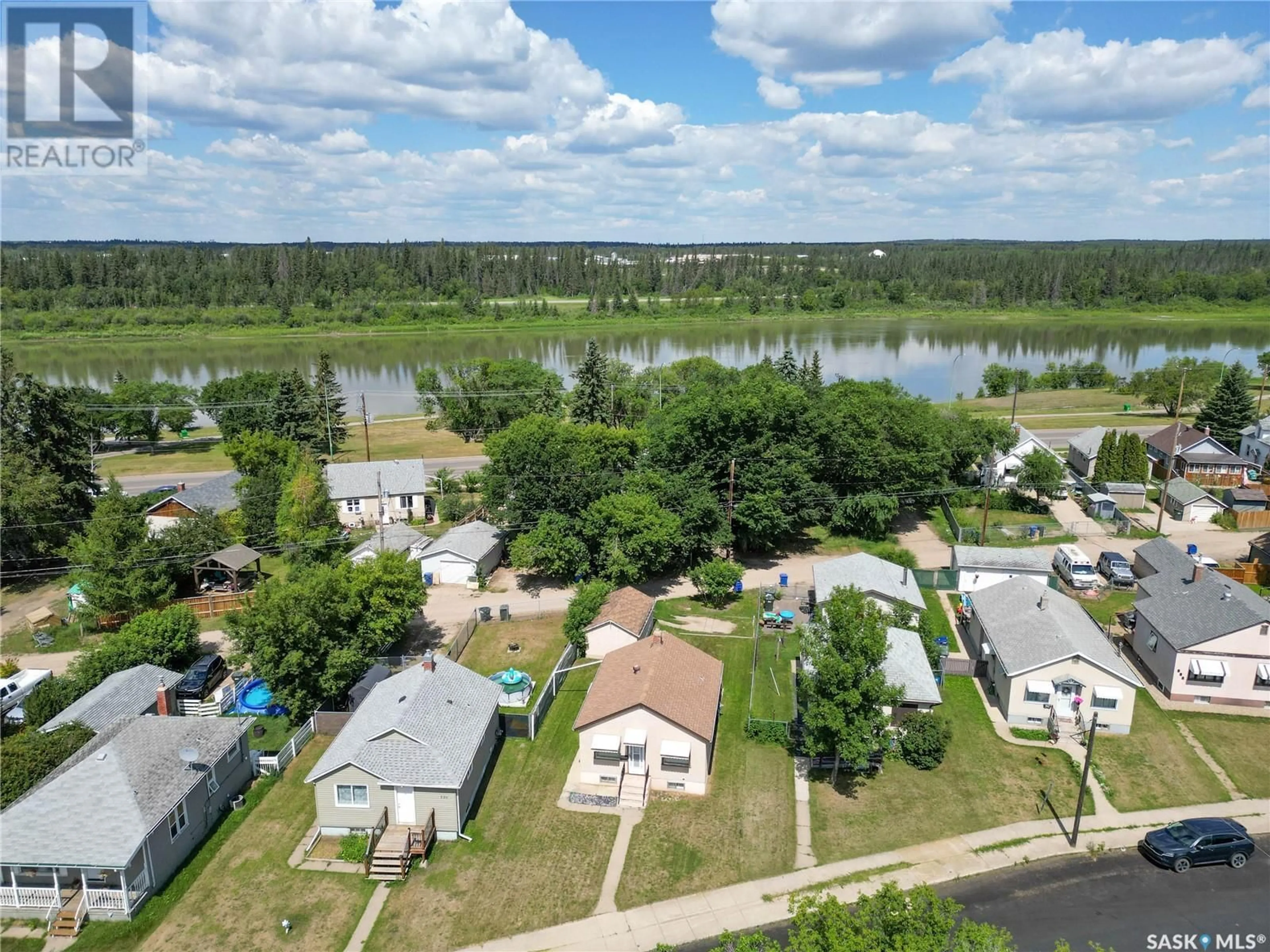 A pic from outside/outdoor area/front of a property/back of a property/a pic from drone, water/lake/river/ocean view for 226 6TH STREET, Prince Albert Saskatchewan S6V0M8