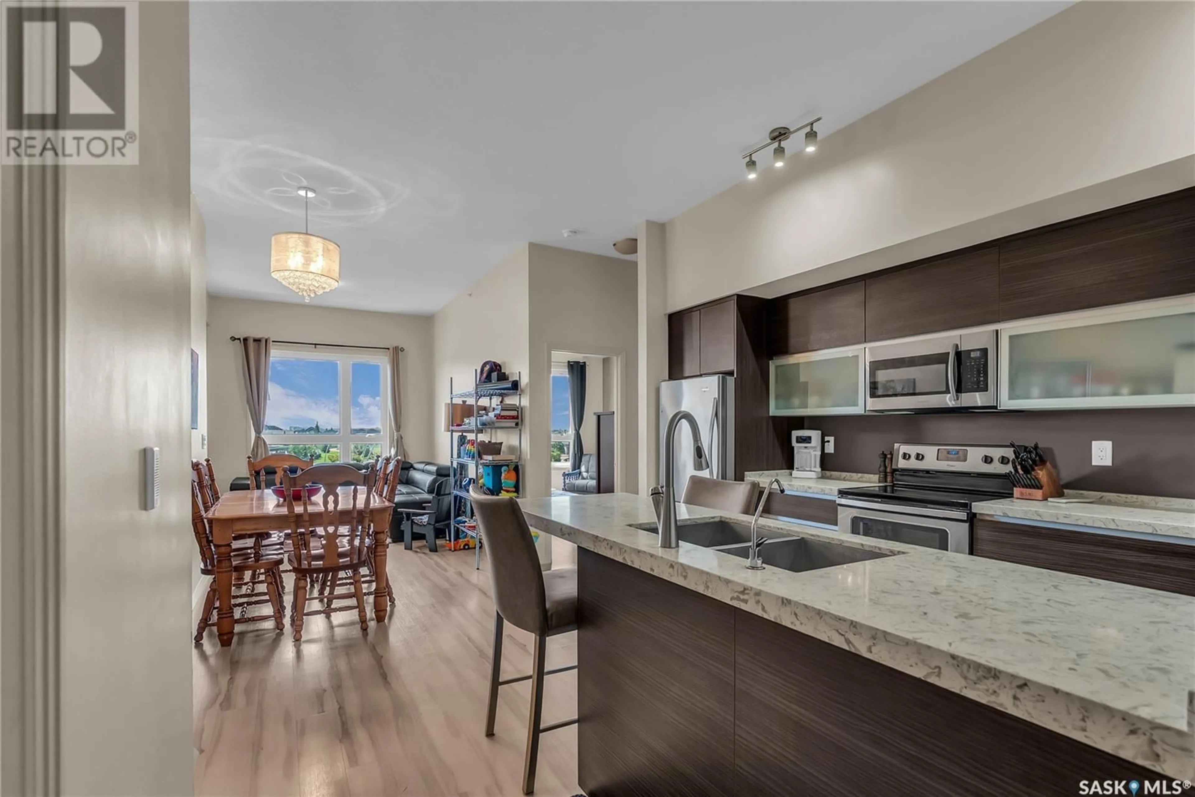Open concept kitchen, unknown for 303 223 EVERGREEN SQUARE, Saskatoon Saskatchewan S7W0W2