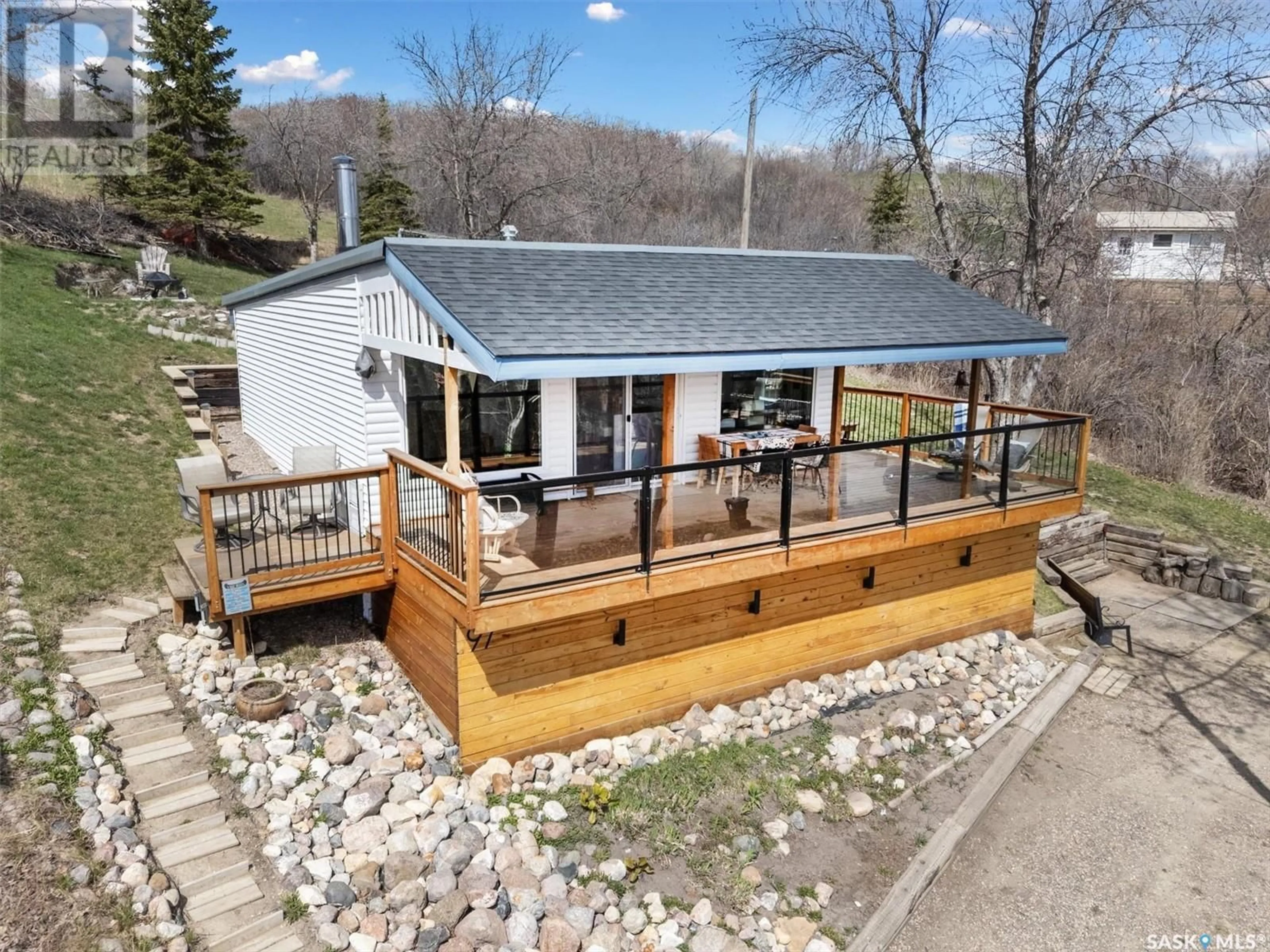 A pic from outside/outdoor area/front of a property/back of a property/a pic from drone, water/lake/river/ocean view for 97 SUMMERFELDT DRIVE, Thode Saskatchewan S7C0A4