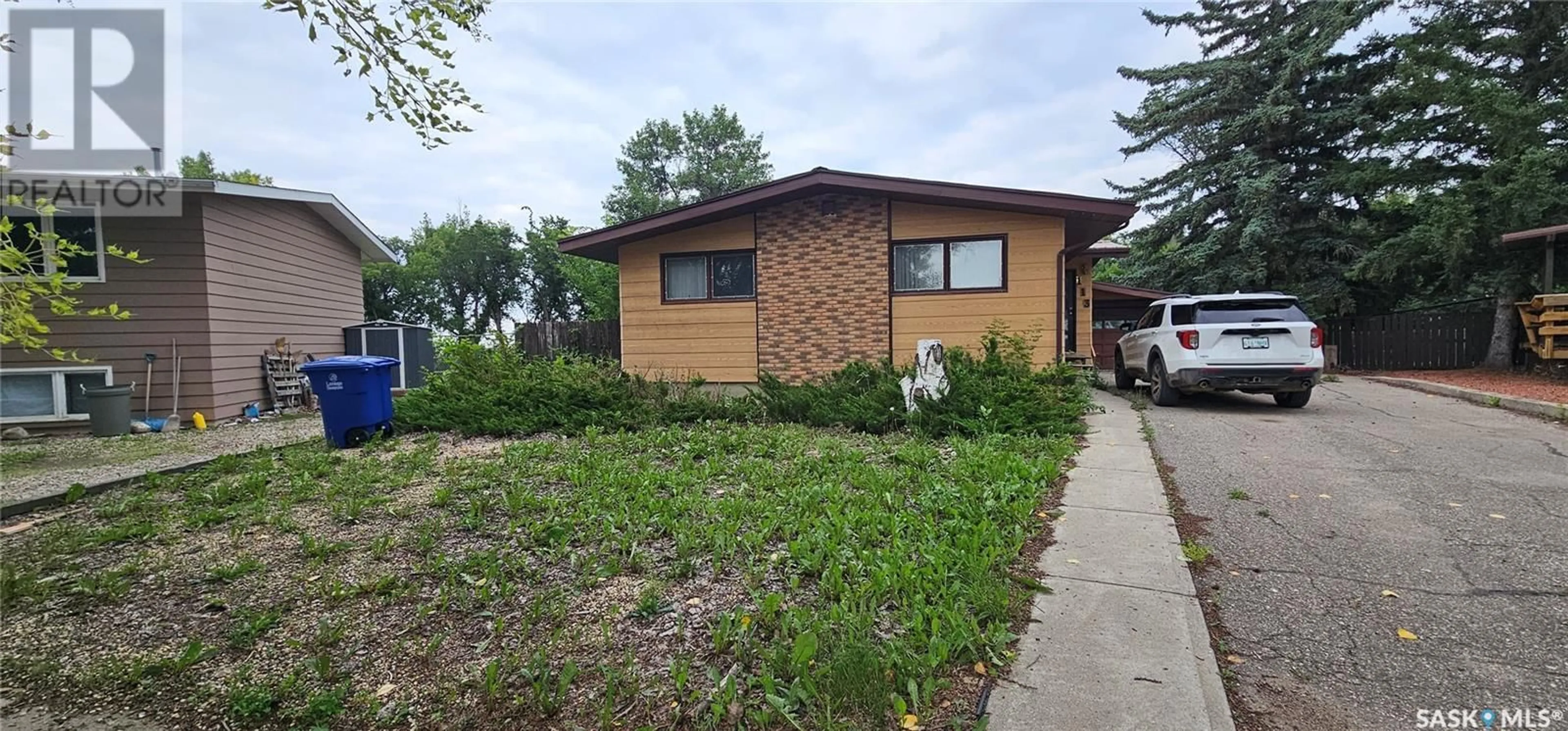 Home with brick exterior material, street for 113 JUBILEE CRESCENT, Rosetown Saskatchewan S0L2V0