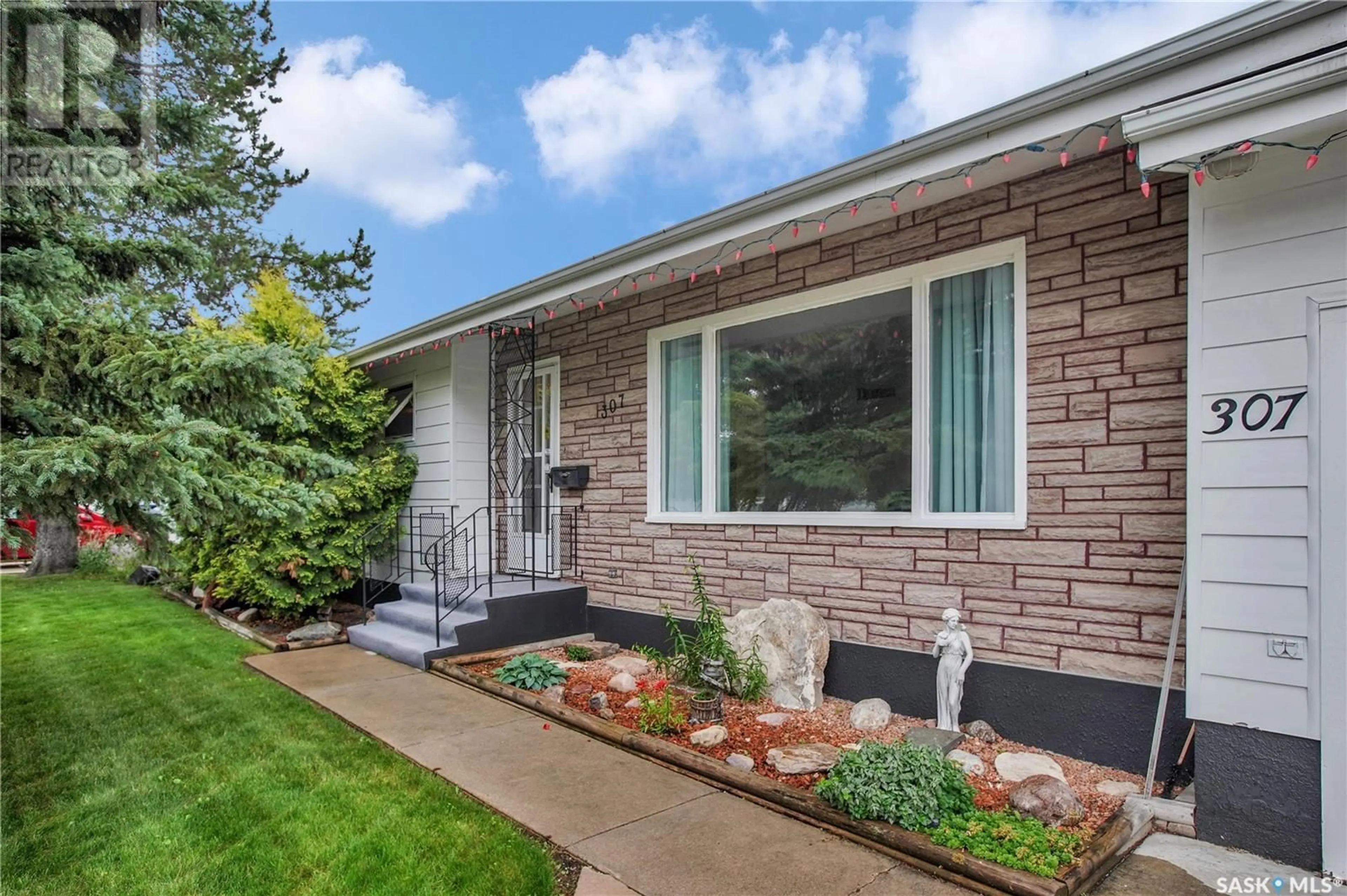 Home with brick exterior material, street for 307 U AVENUE, Saskatoon Saskatchewan S7L3C6