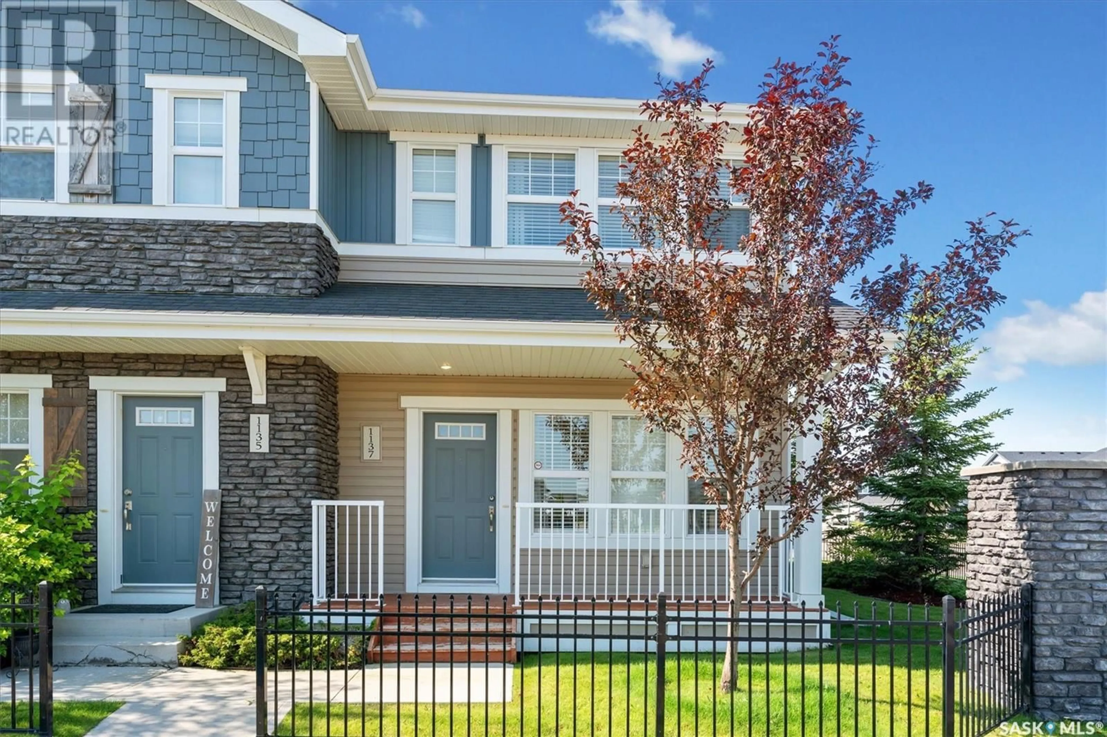 Home with vinyl exterior material, street for 1137 KOLYNCHUK LINK, Saskatoon Saskatchewan S7T0X5