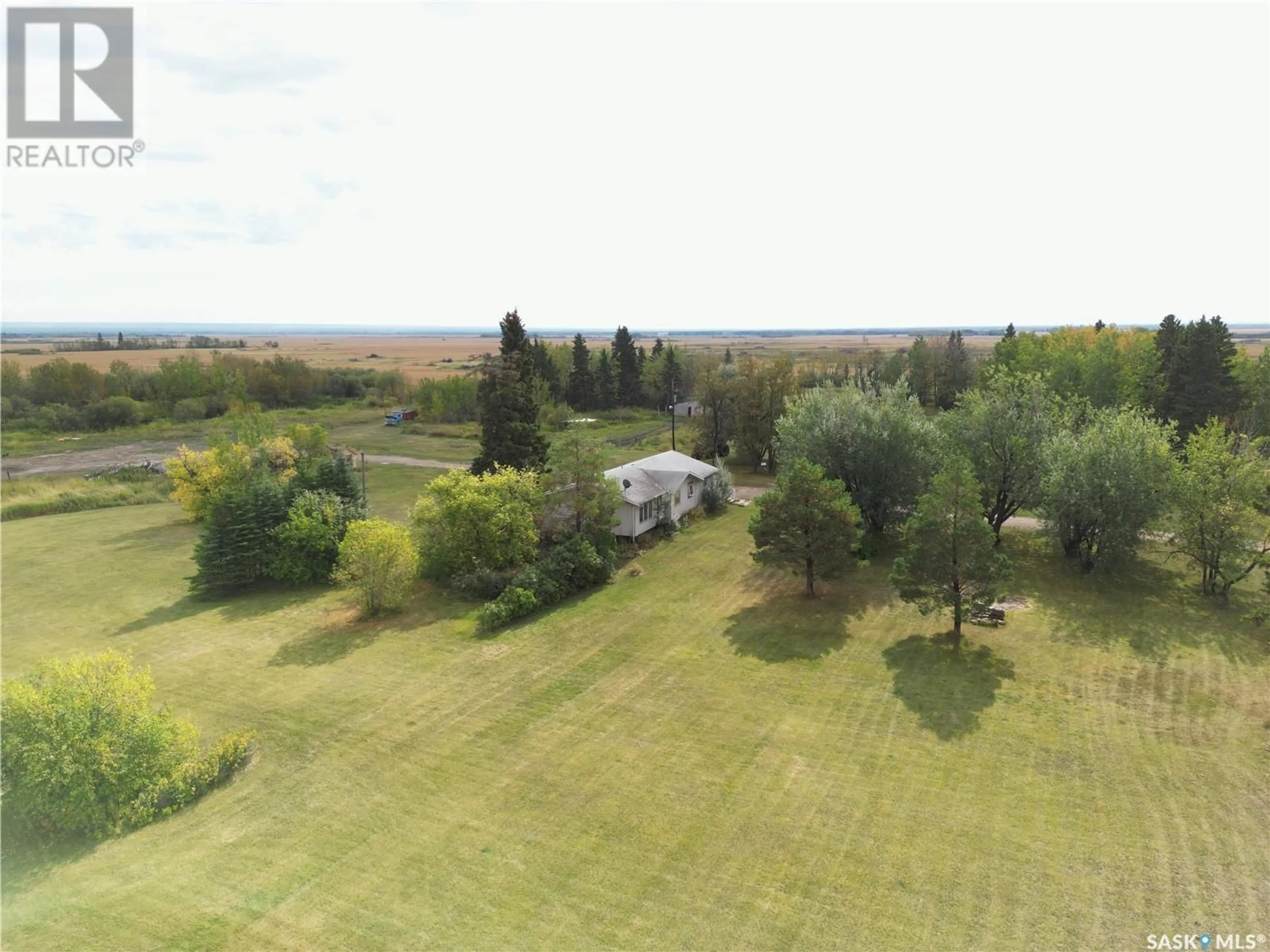 A pic from outside/outdoor area/front of a property/back of a property/a pic from drone, unknown for TEMPLE T, Hudson Bay Rm No. 394 Saskatchewan S0E0Y0