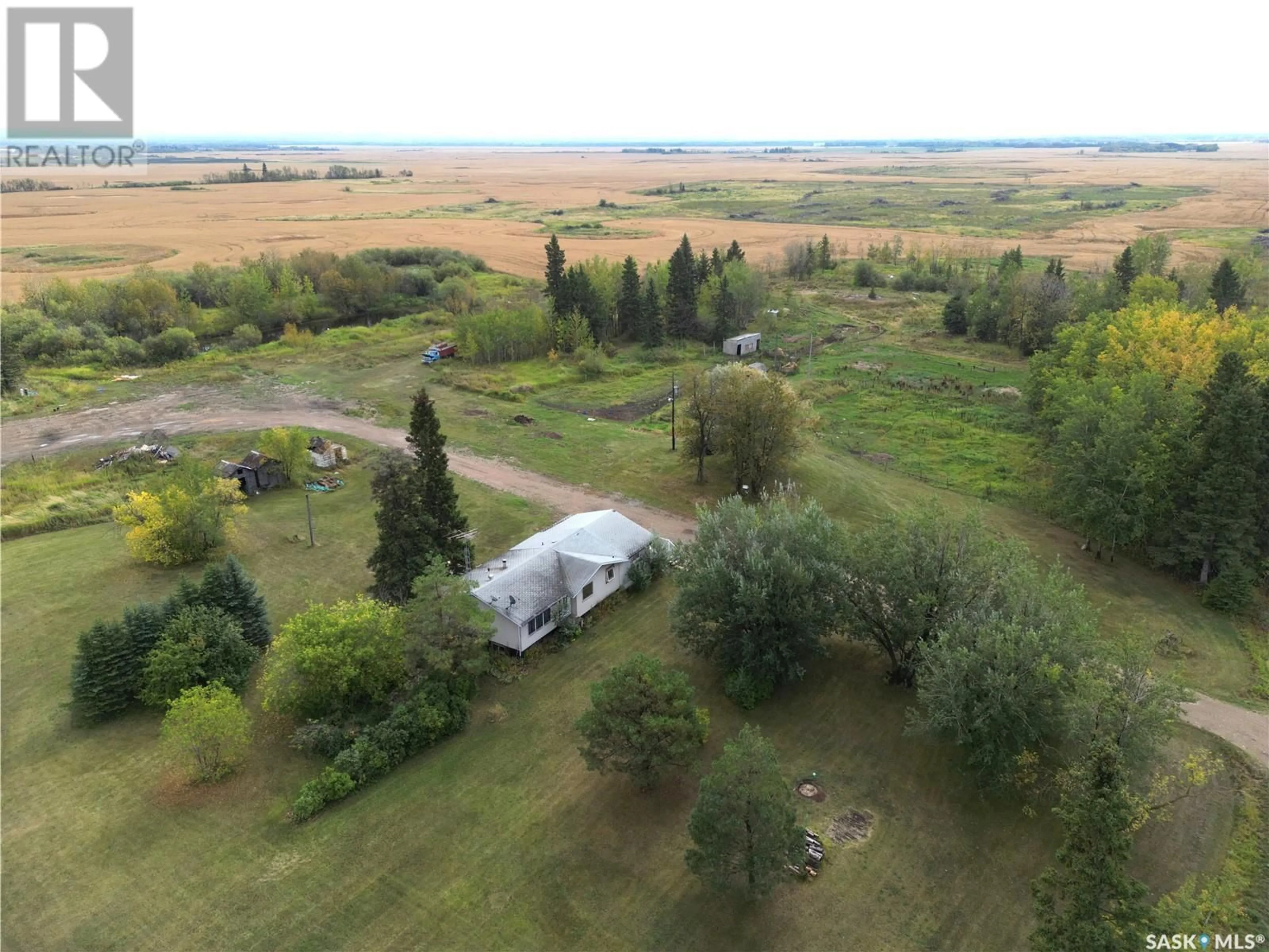 A pic from outside/outdoor area/front of a property/back of a property/a pic from drone, unknown for TEMPLE T, Hudson Bay Rm No. 394 Saskatchewan S0E0Y0