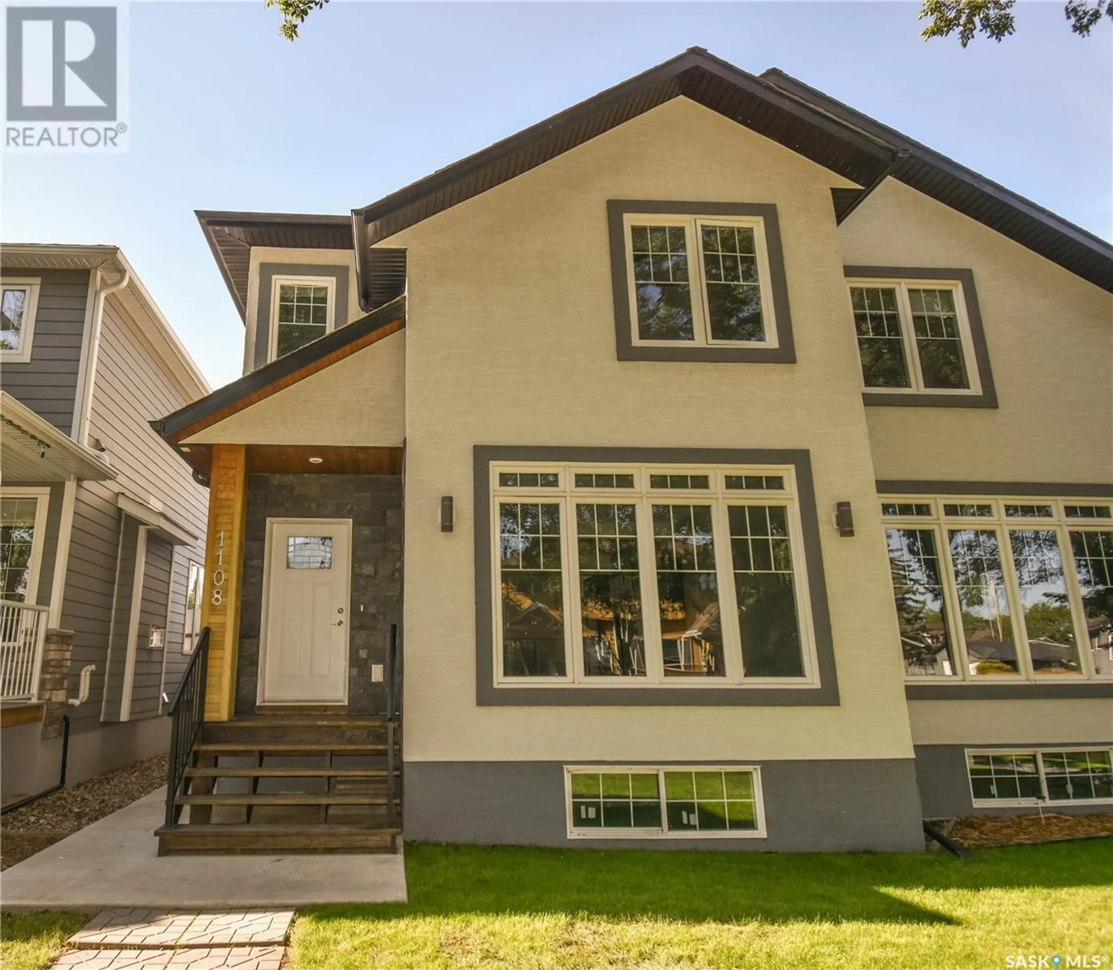 Home with vinyl exterior material, street for 1108 9TH STREET, Saskatoon Saskatchewan S7H0N5