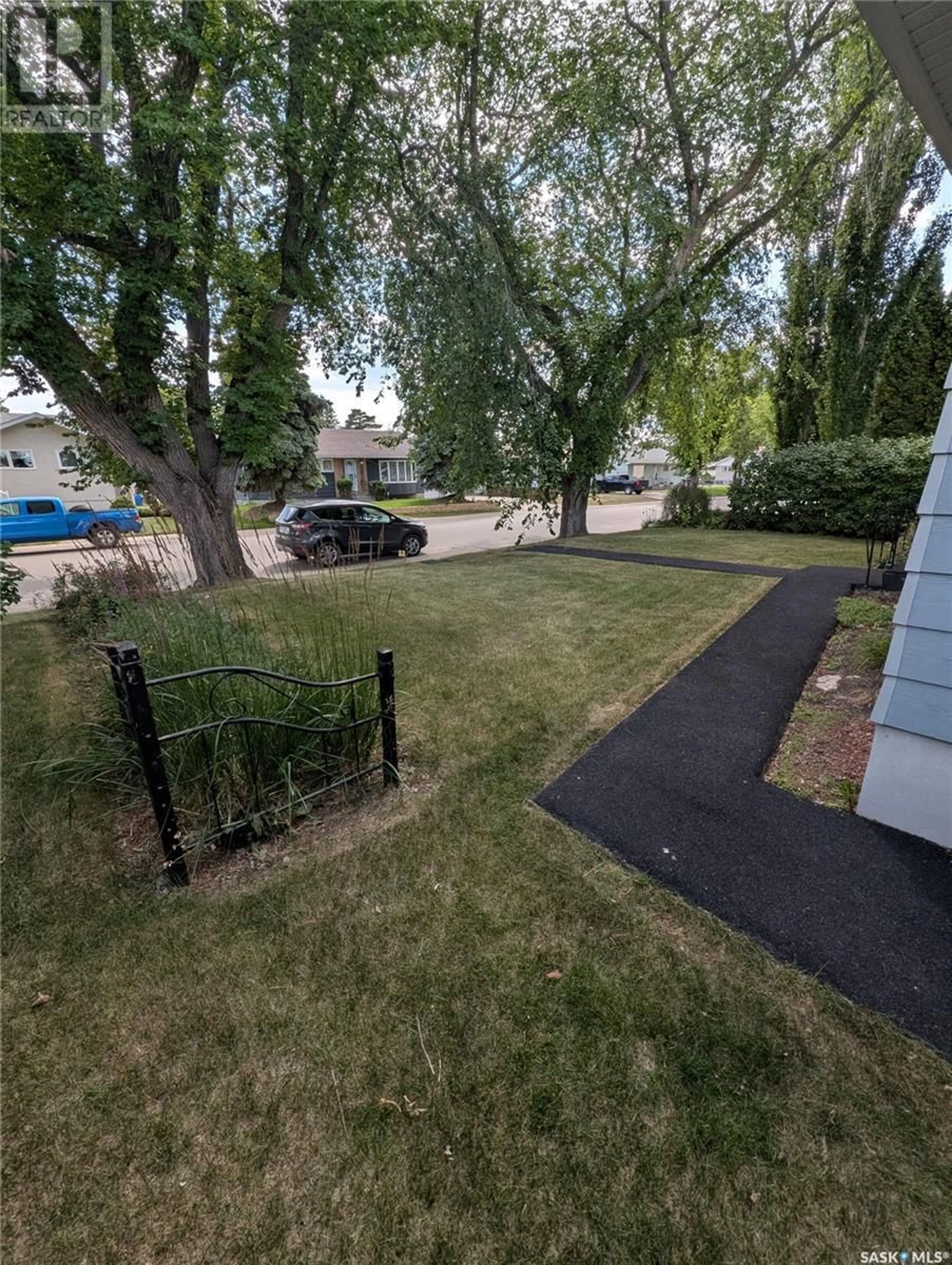 A pic from outside/outdoor area/front of a property/back of a property/a pic from drone, street for 330 25TH STREET, Prince Albert Saskatchewan S6V1T1