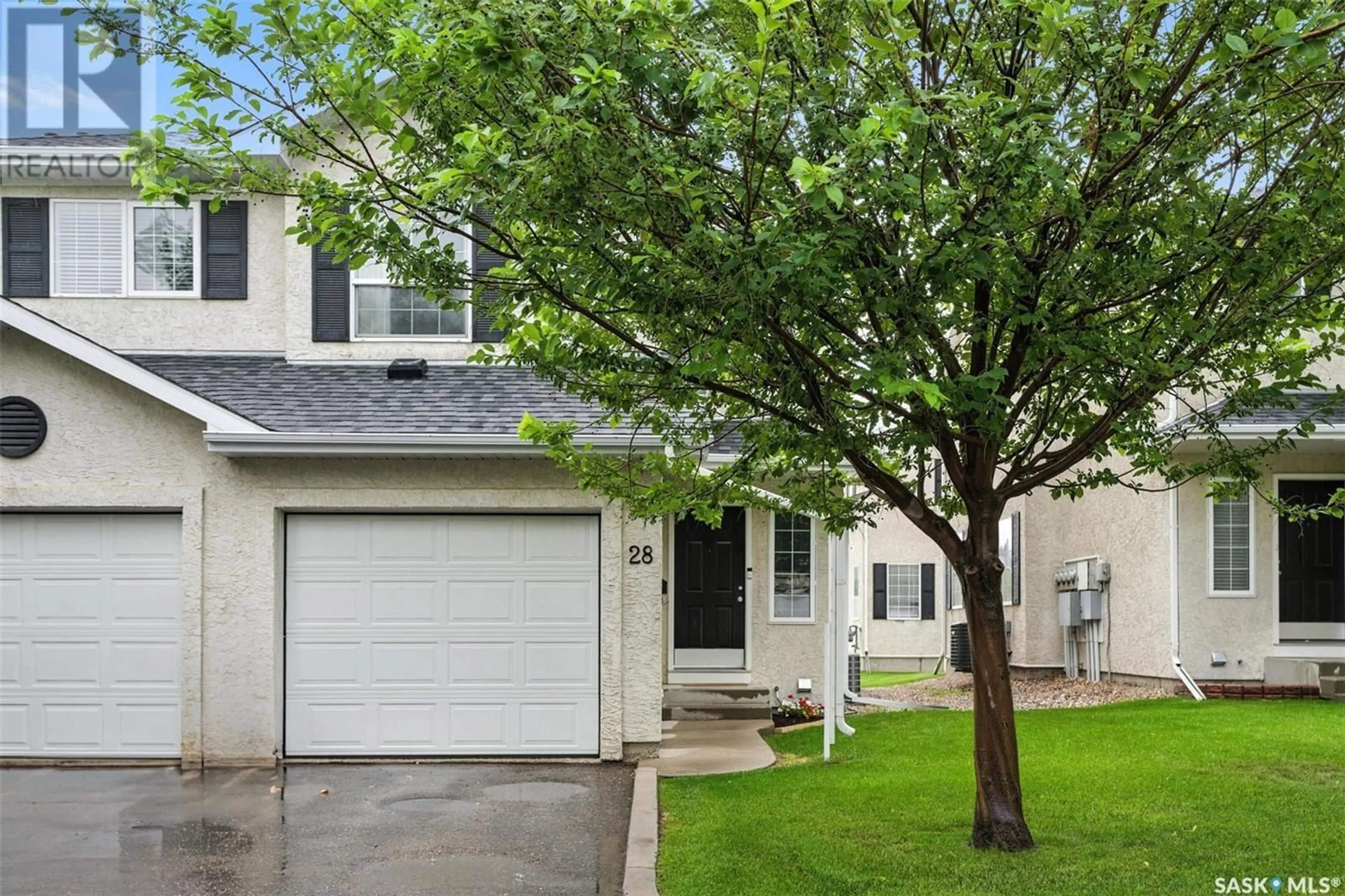 Home with vinyl exterior material, street for 28 110 BANYAN CRESCENT, Saskatoon Saskatchewan S7V1G7