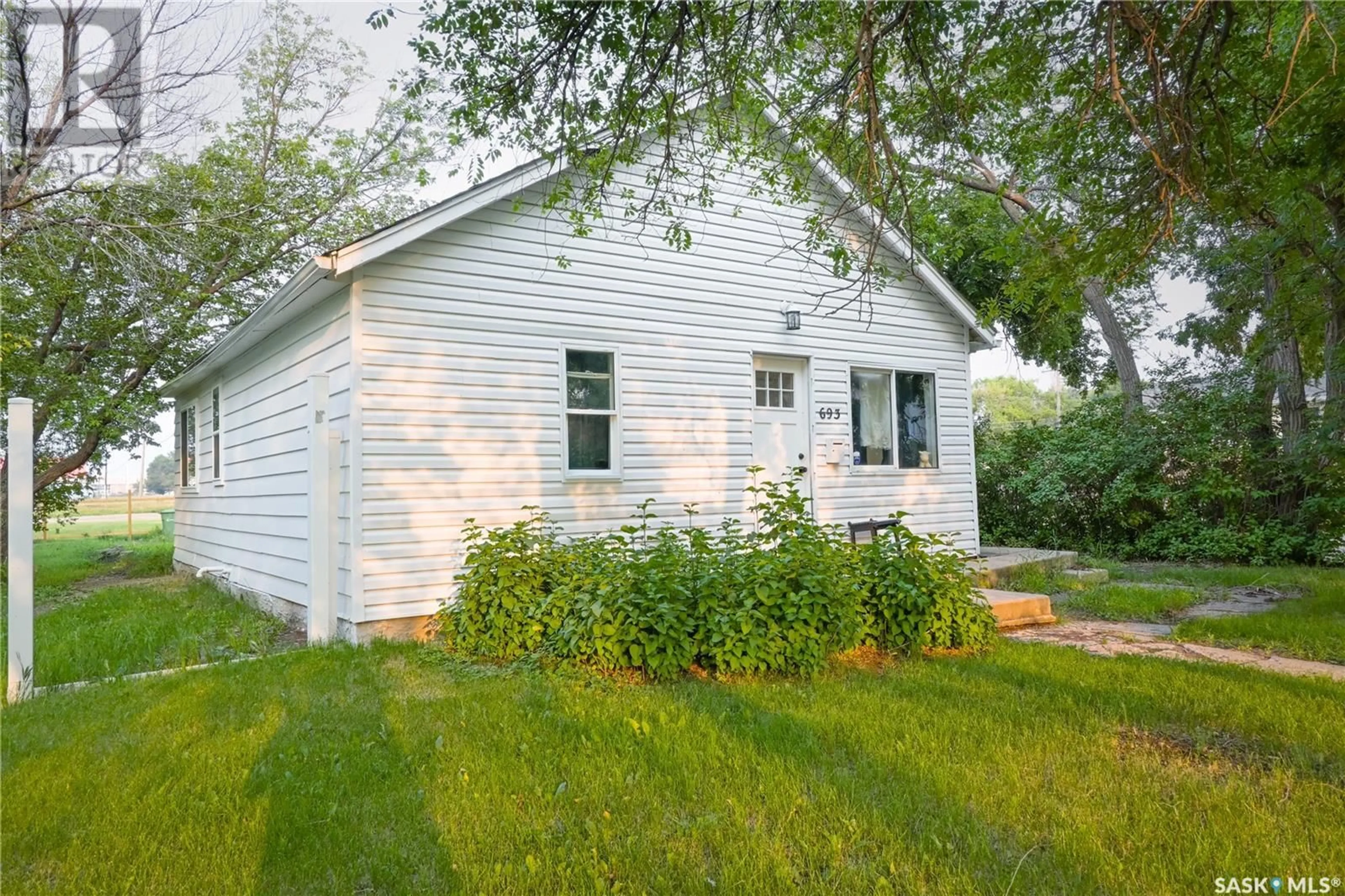 Home with vinyl exterior material, street for 693 RETALLACK STREET, Regina Saskatchewan S4T2G5