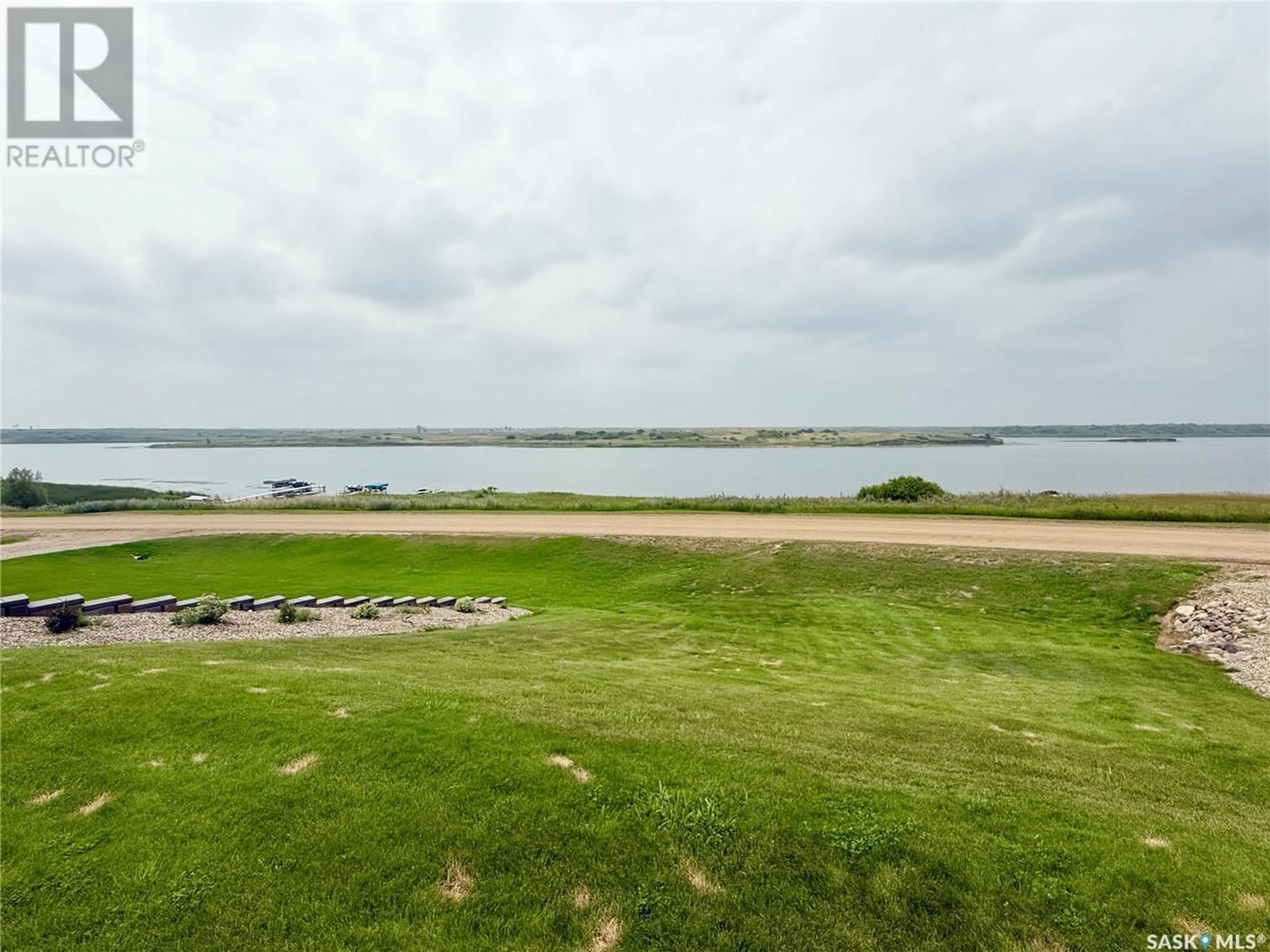A pic from outside/outdoor area/front of a property/back of a property/a pic from drone, water/lake/river/ocean view for 4 ISLAND VIEW, Cymri Rm No. 36 Saskatchewan S0C1S0