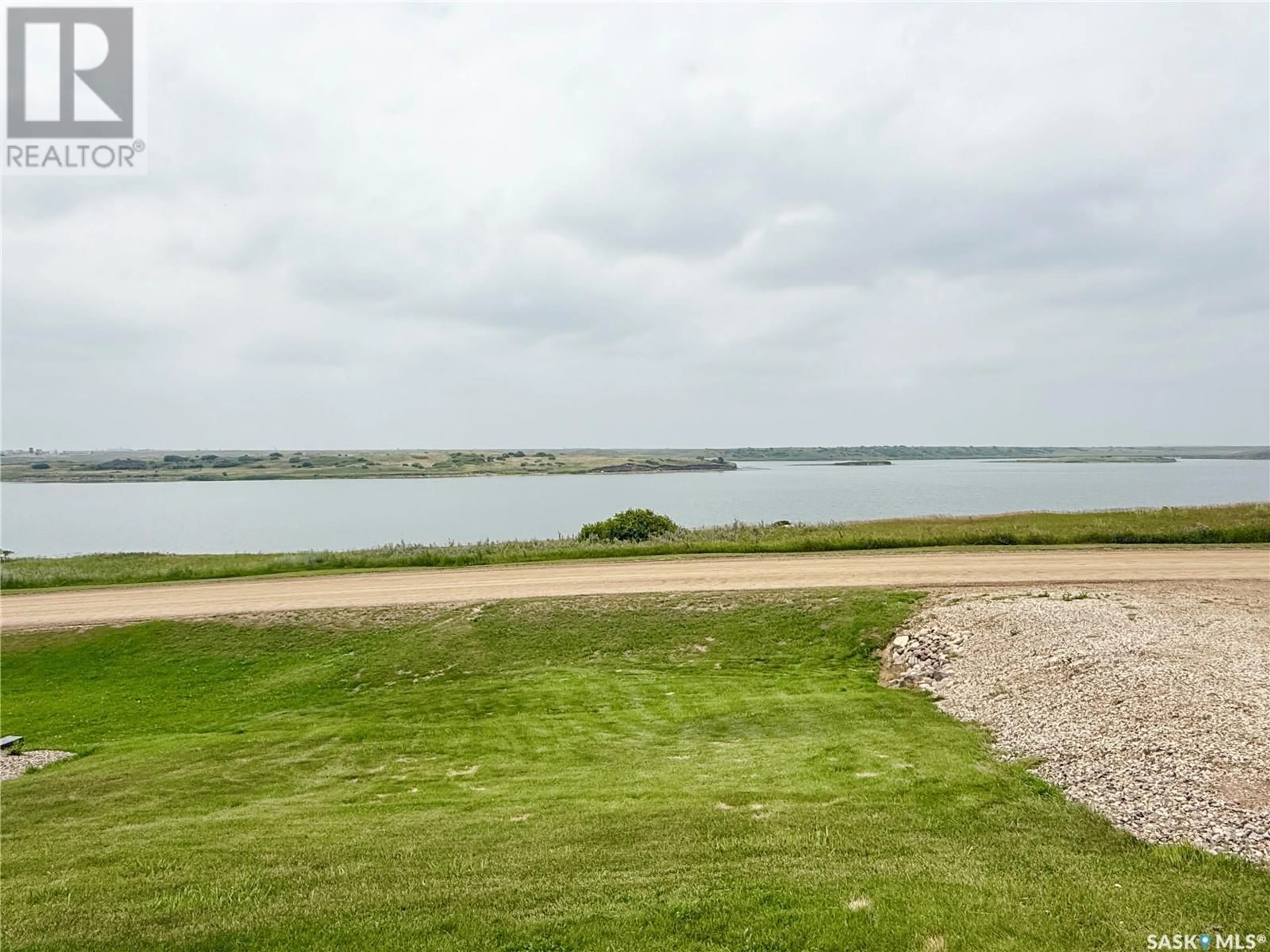 A pic from outside/outdoor area/front of a property/back of a property/a pic from drone, water/lake/river/ocean view for 4 ISLAND VIEW, Cymri Rm No. 36 Saskatchewan S0C1S0