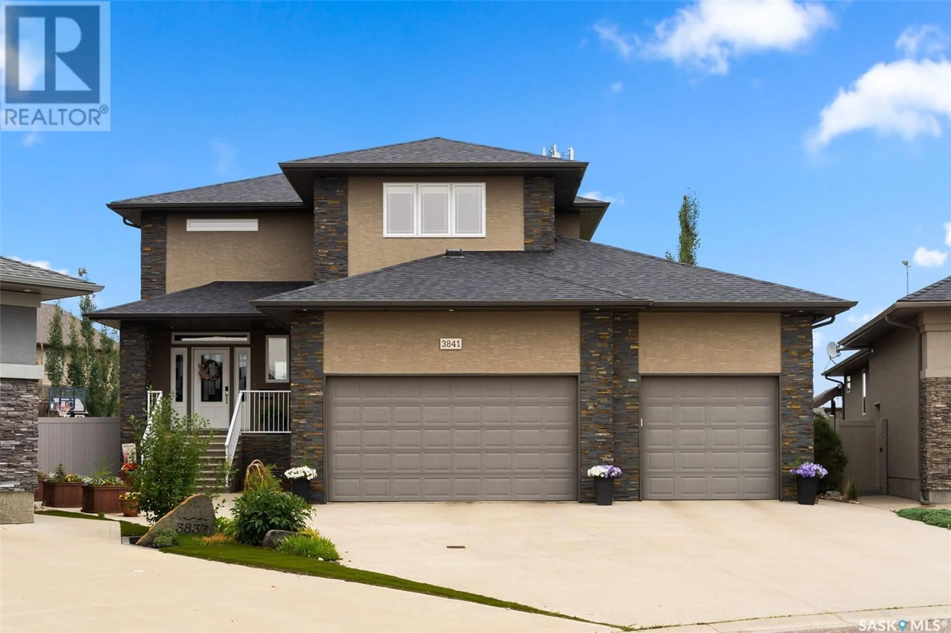 Home with vinyl exterior material, street for 3841 GOLDFINCH WAY, Regina Saskatchewan S4V1S4