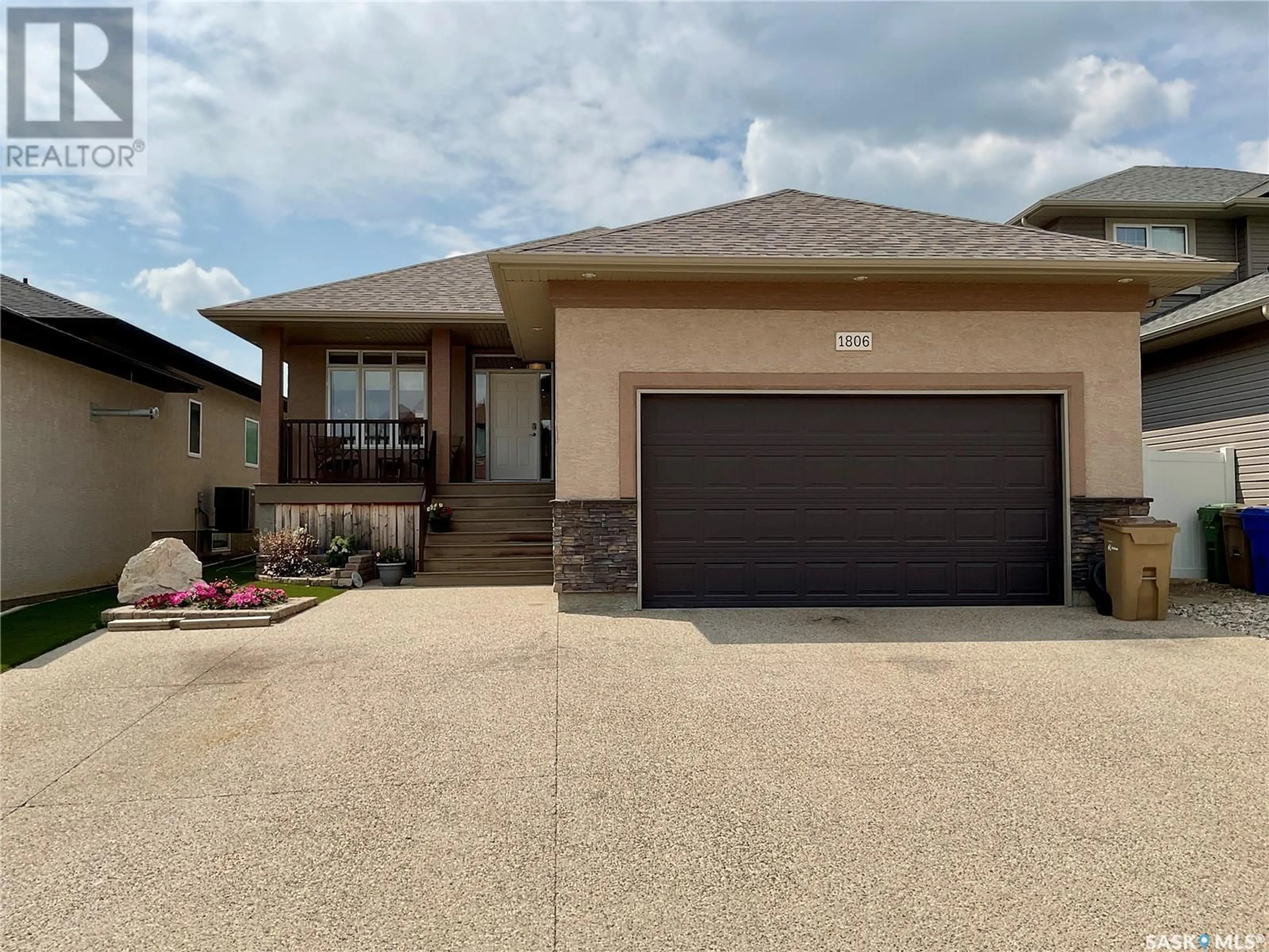Home with brick exterior material, street for 1806 BLAKE ROAD, Regina Saskatchewan S4X0G5