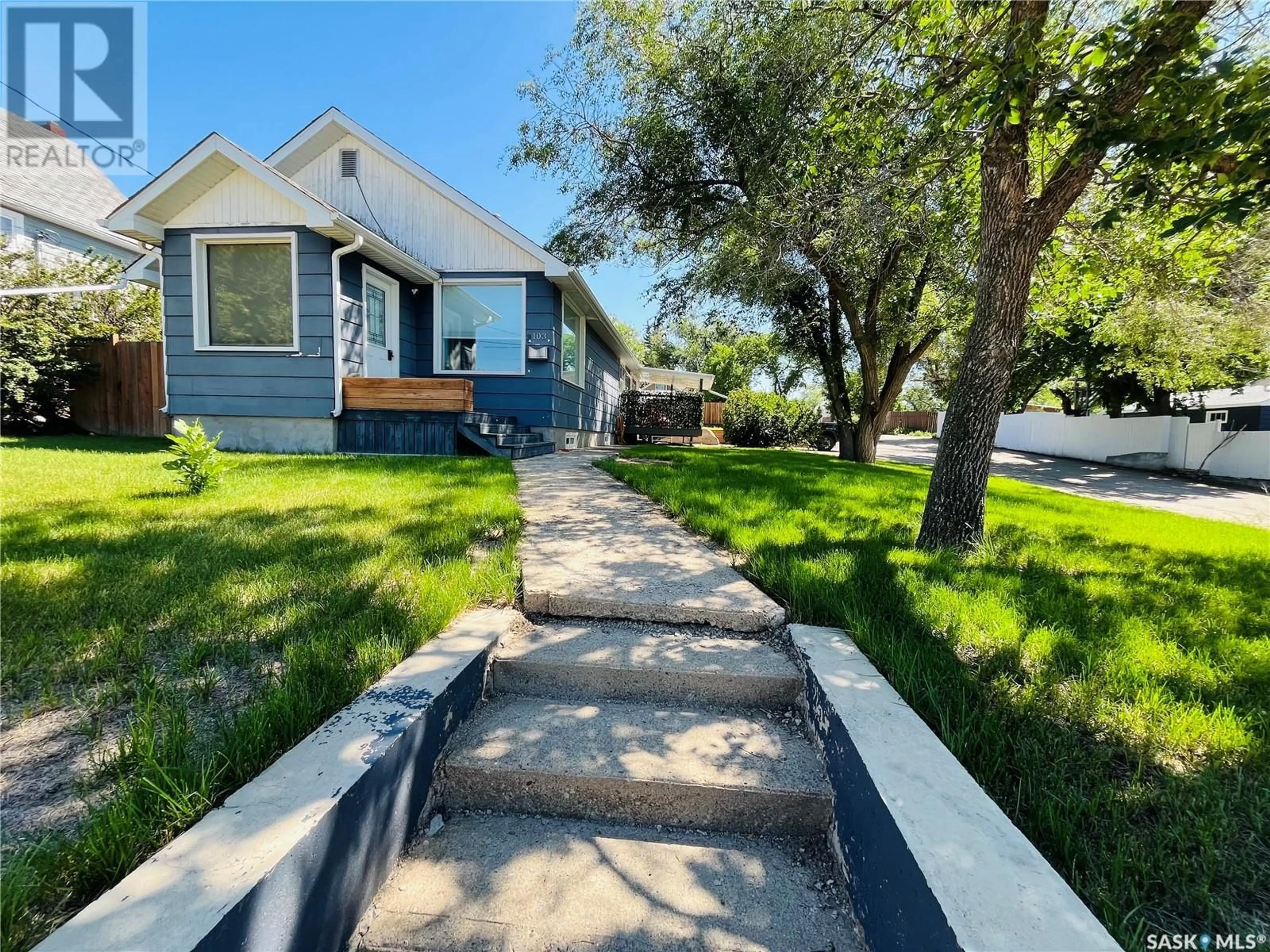 A pic from outside/outdoor area/front of a property/back of a property/a pic from drone, street for 103 6TH AVENUE, Swift Current Saskatchewan S9H2L9
