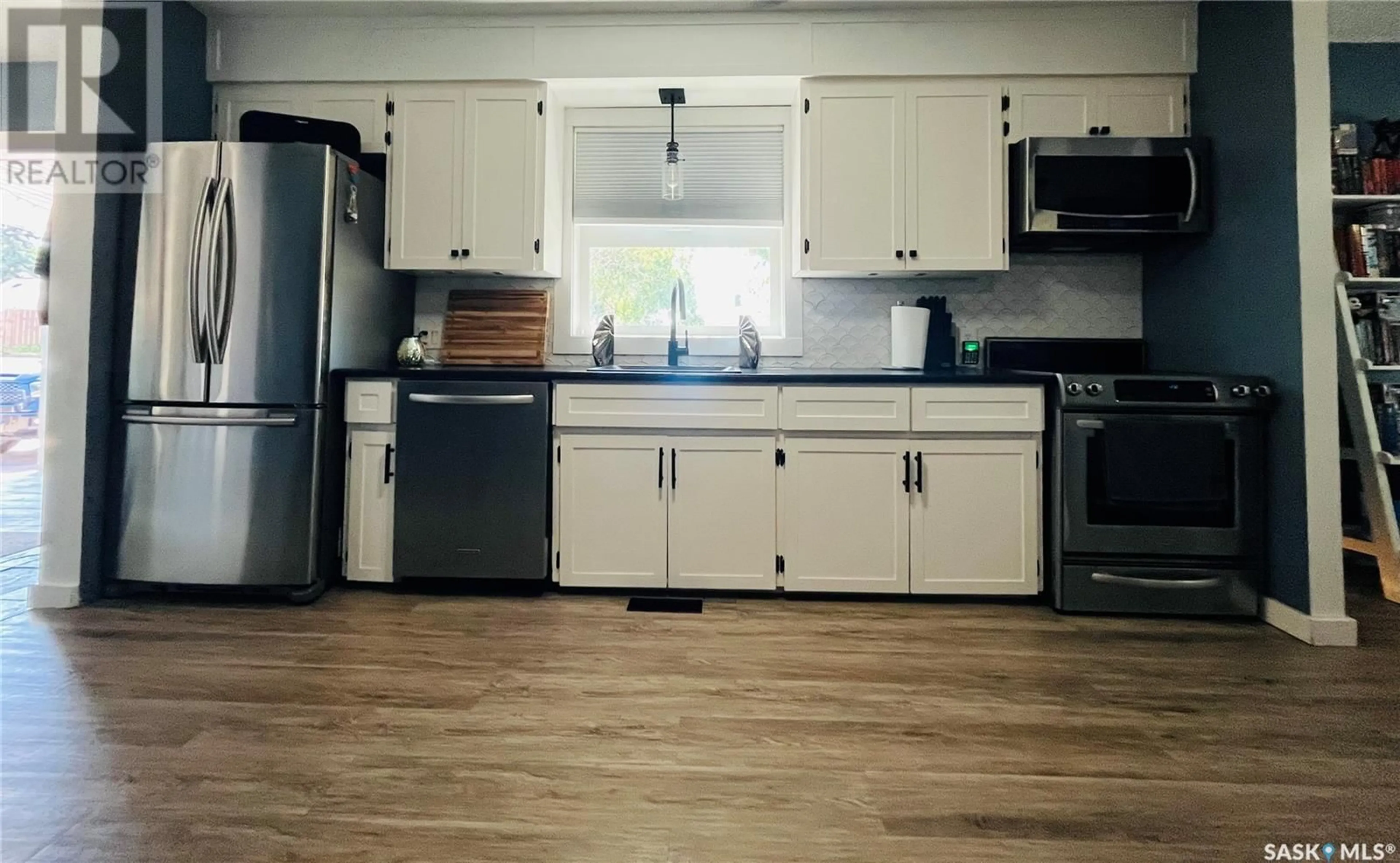 Open concept kitchen, unknown for 103 6TH AVENUE, Swift Current Saskatchewan S9H2L9